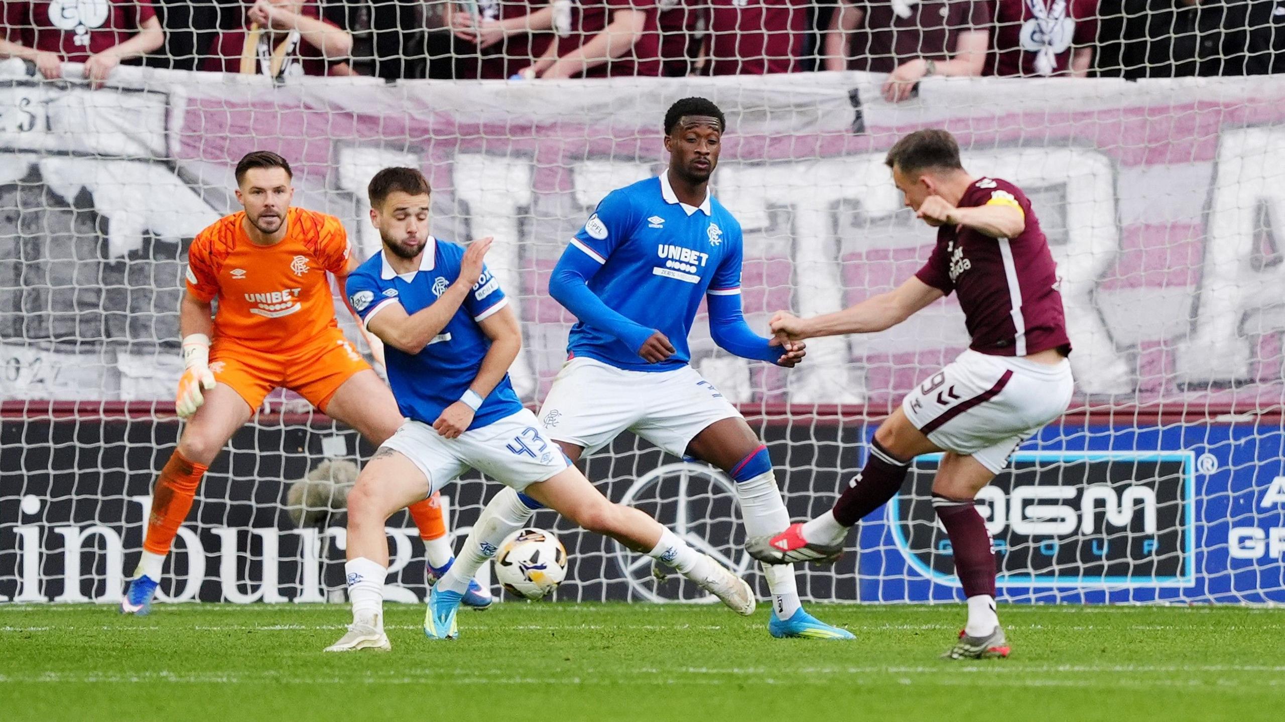 Lawrence Shankland scores for Hearts against Rangers