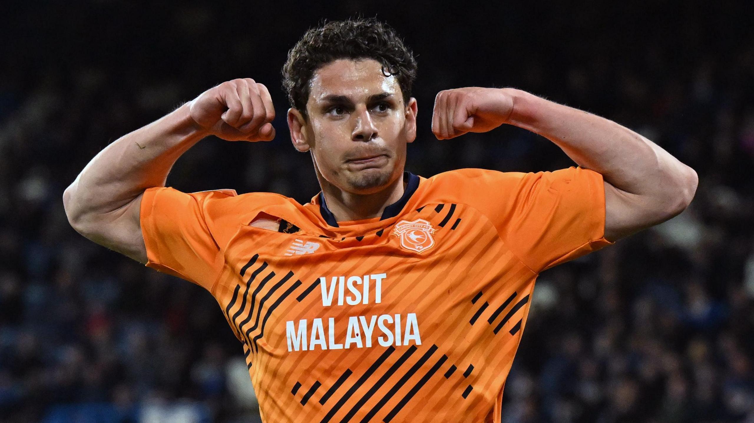 Yousef Salech celebrates scoring for Cardiff at Huddersfield