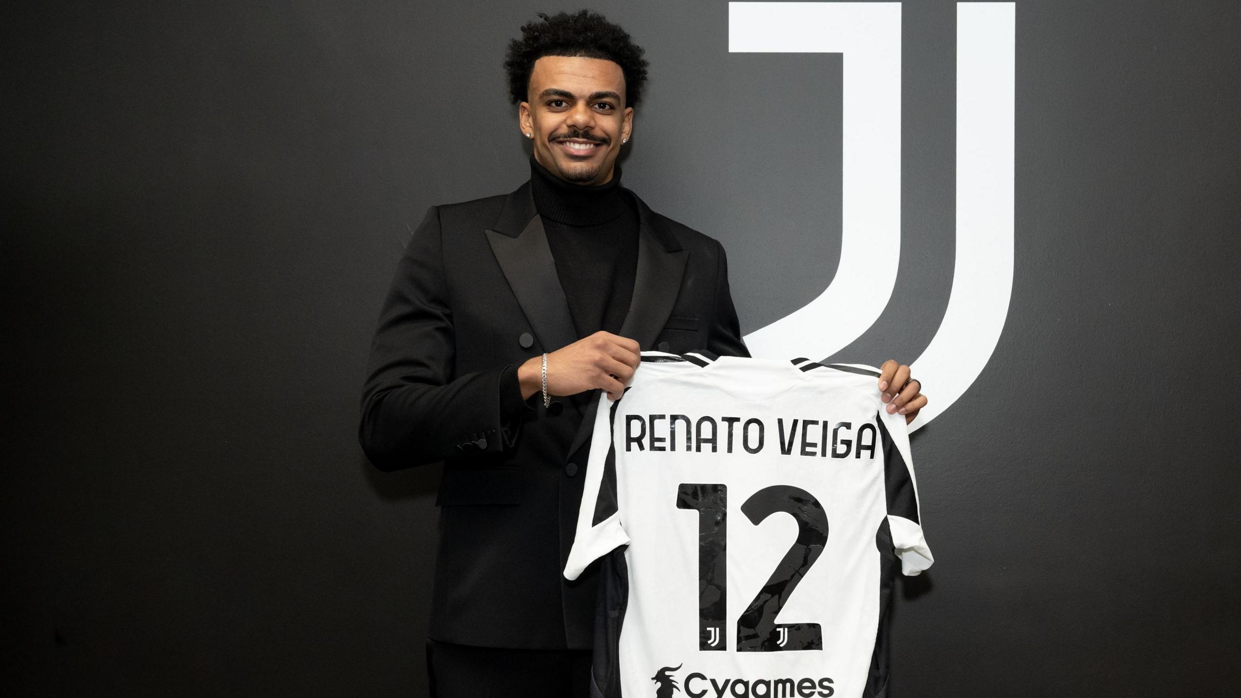 Renato Veiga poses with a Juventus shirt