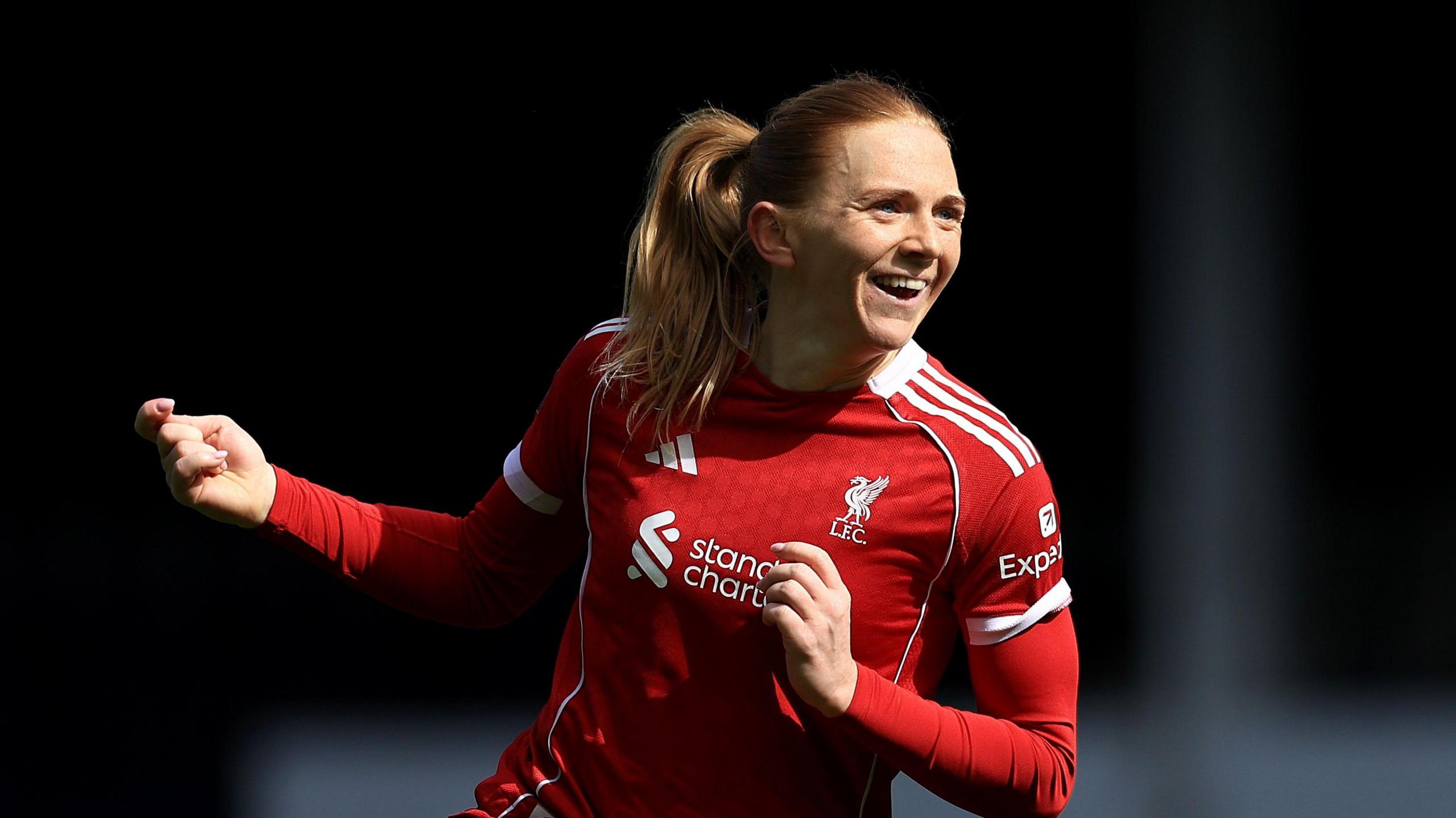 Ceri Holland celebrates scoring second goal for Liverpool