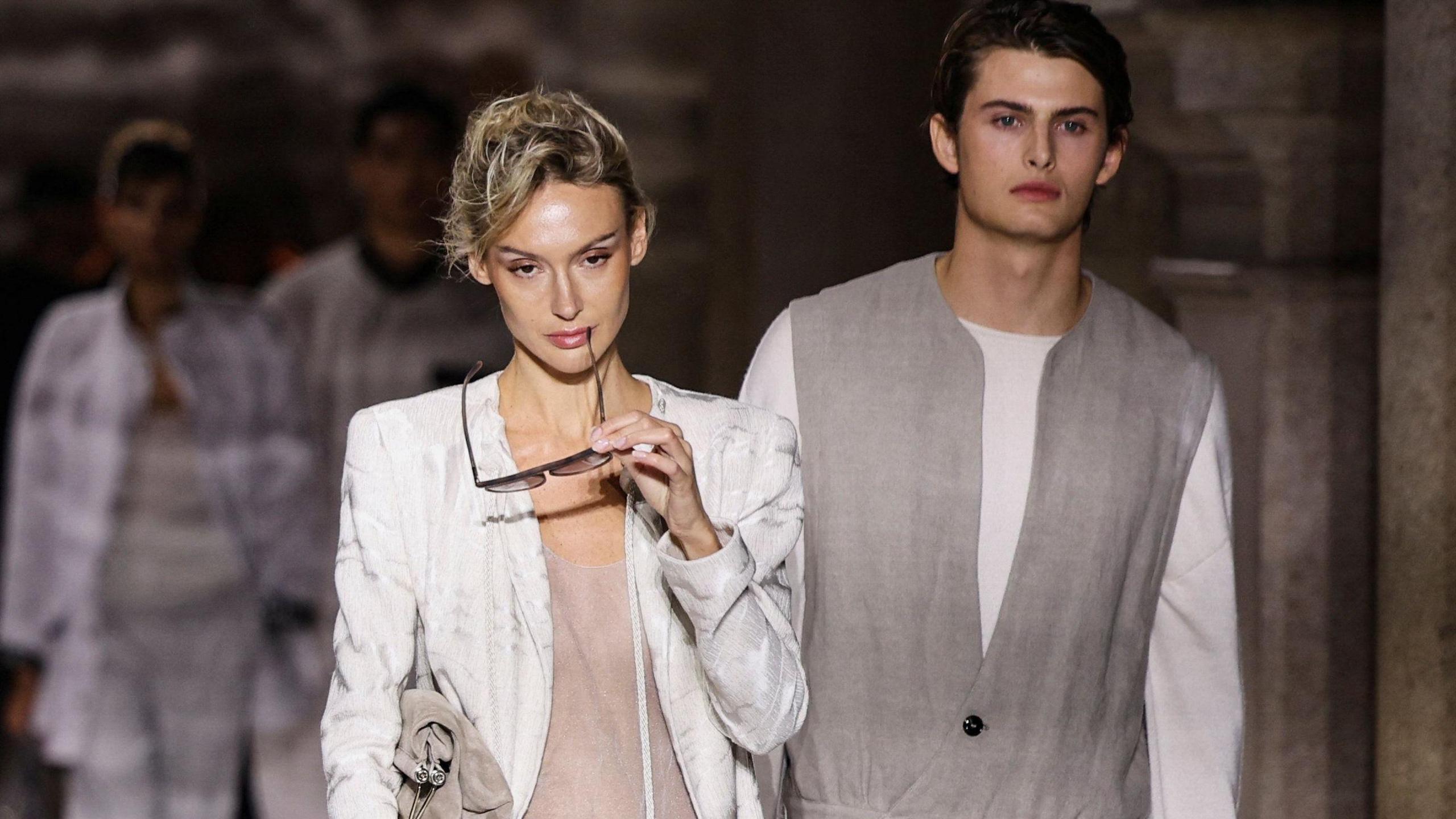 Models present creations from the Giorgio Armani Spring/Summer 2026 collection during Fashion Week in Milan, Italy, September 28, 2025.