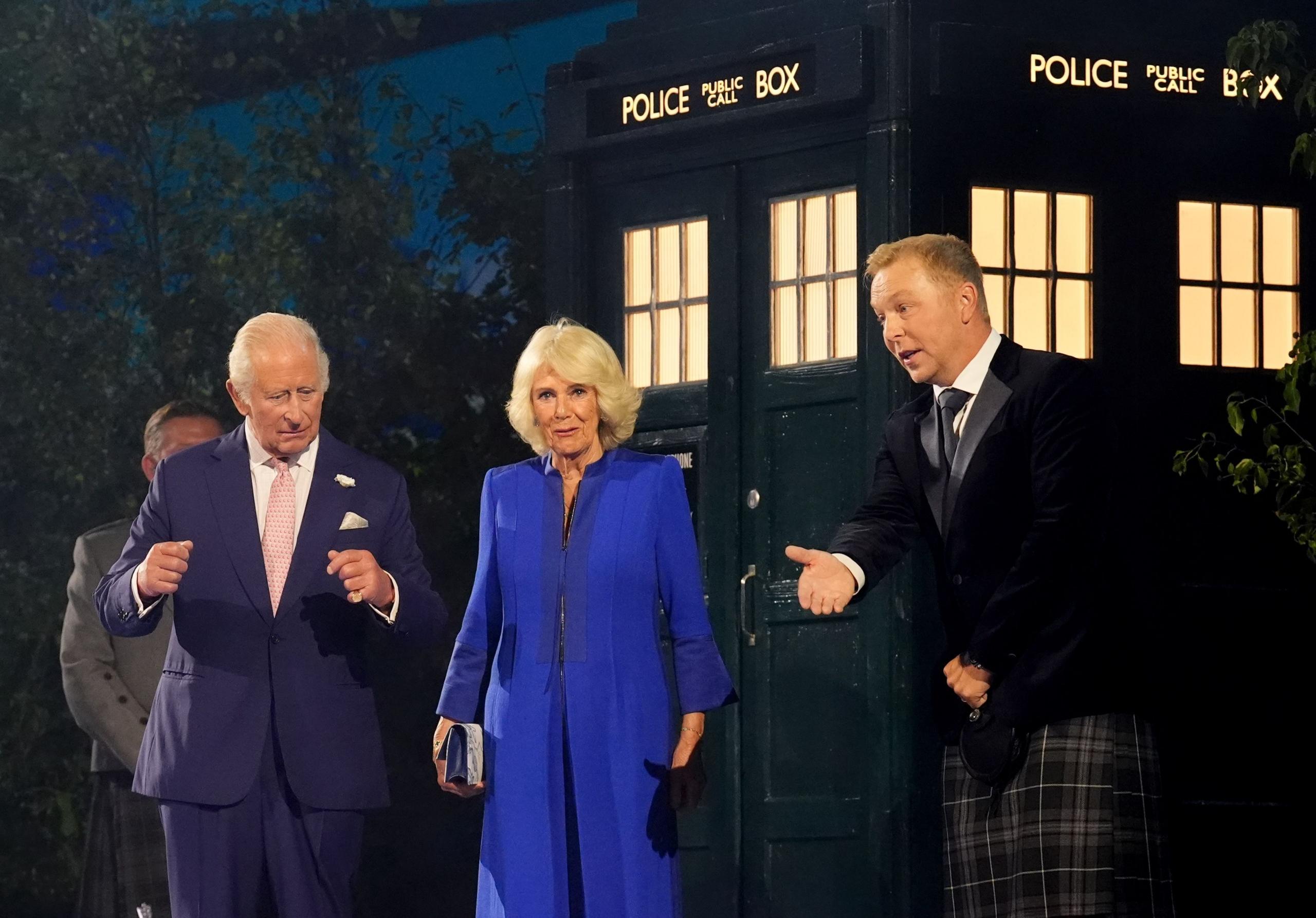 King Charles III, Queen Camilla and Sir Chris Hoy step out of the TARDIS as they arrive for the opening ceremony for the 2026 Commonwealth Games in Glasgow.