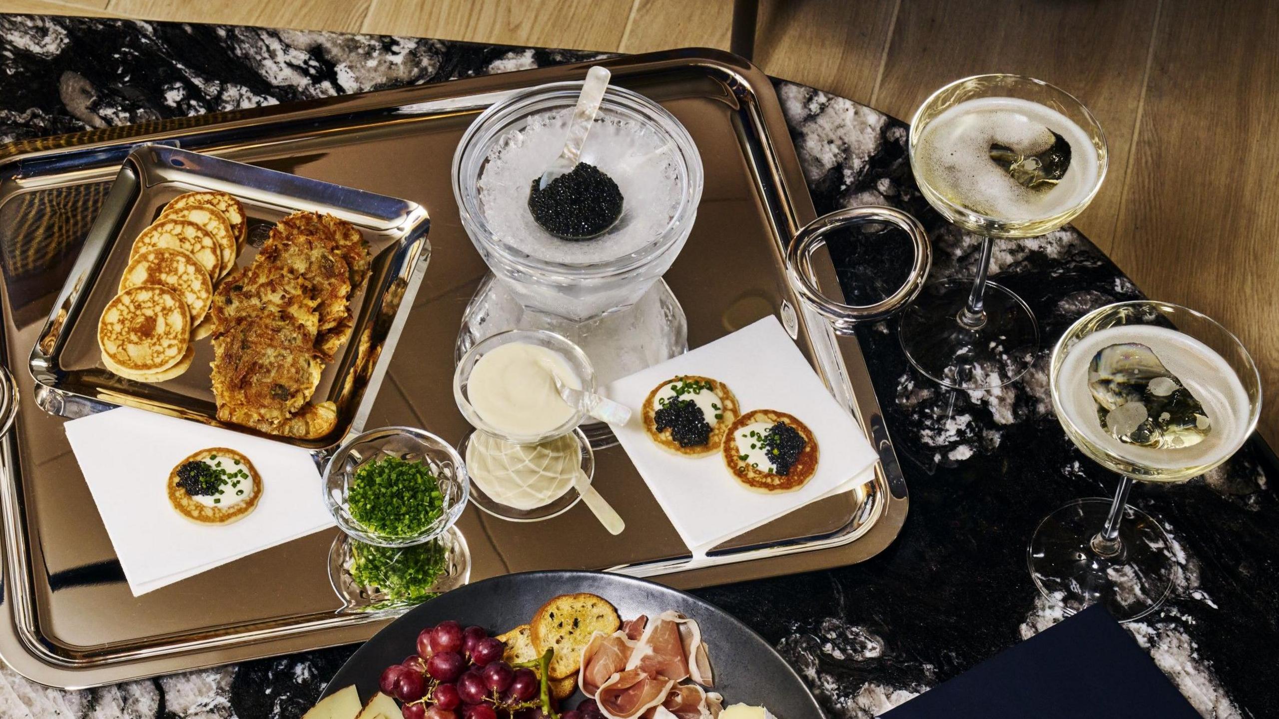 Caviar, pancakes and champagne at Chase's airport lounge