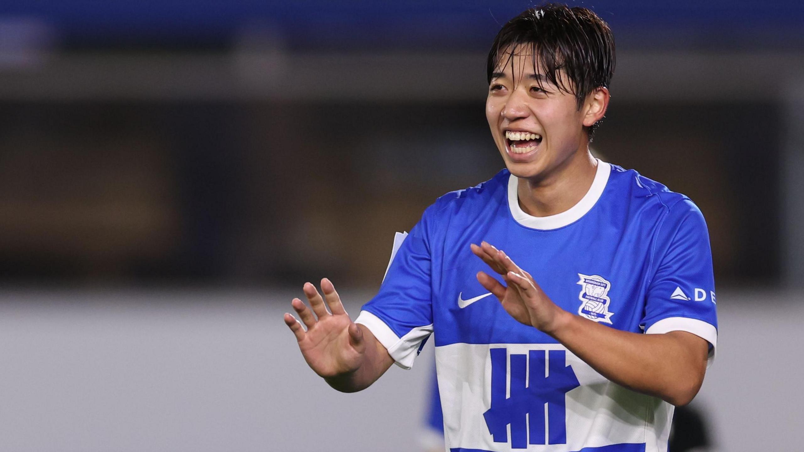 Birmingham City's Japanese forward Ayumu Yokoyama smiles as he celebrates a goal