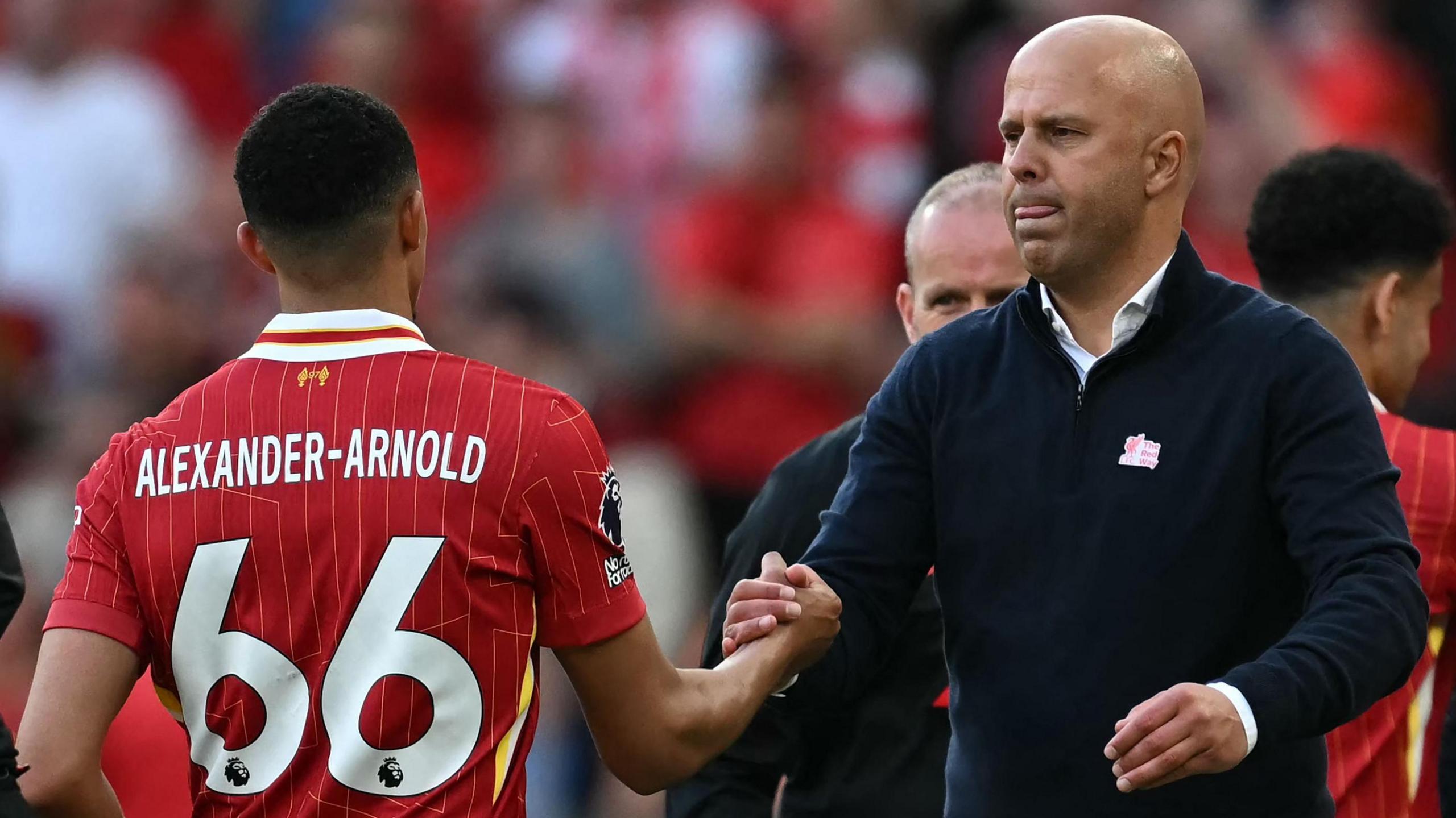 Trent Alexander-Arnold and Arne Slot shaking hands