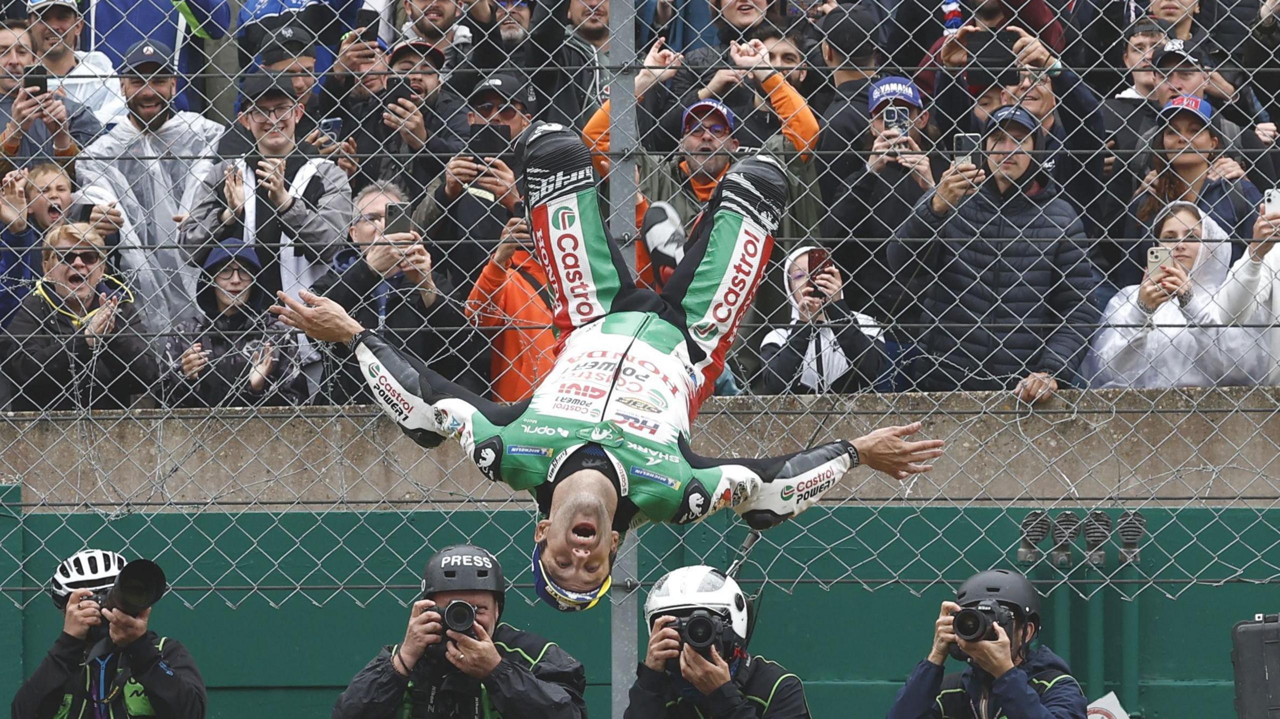 Johann Zarco performs a backflip after winning MotoGP's 2025 French Grand Prix