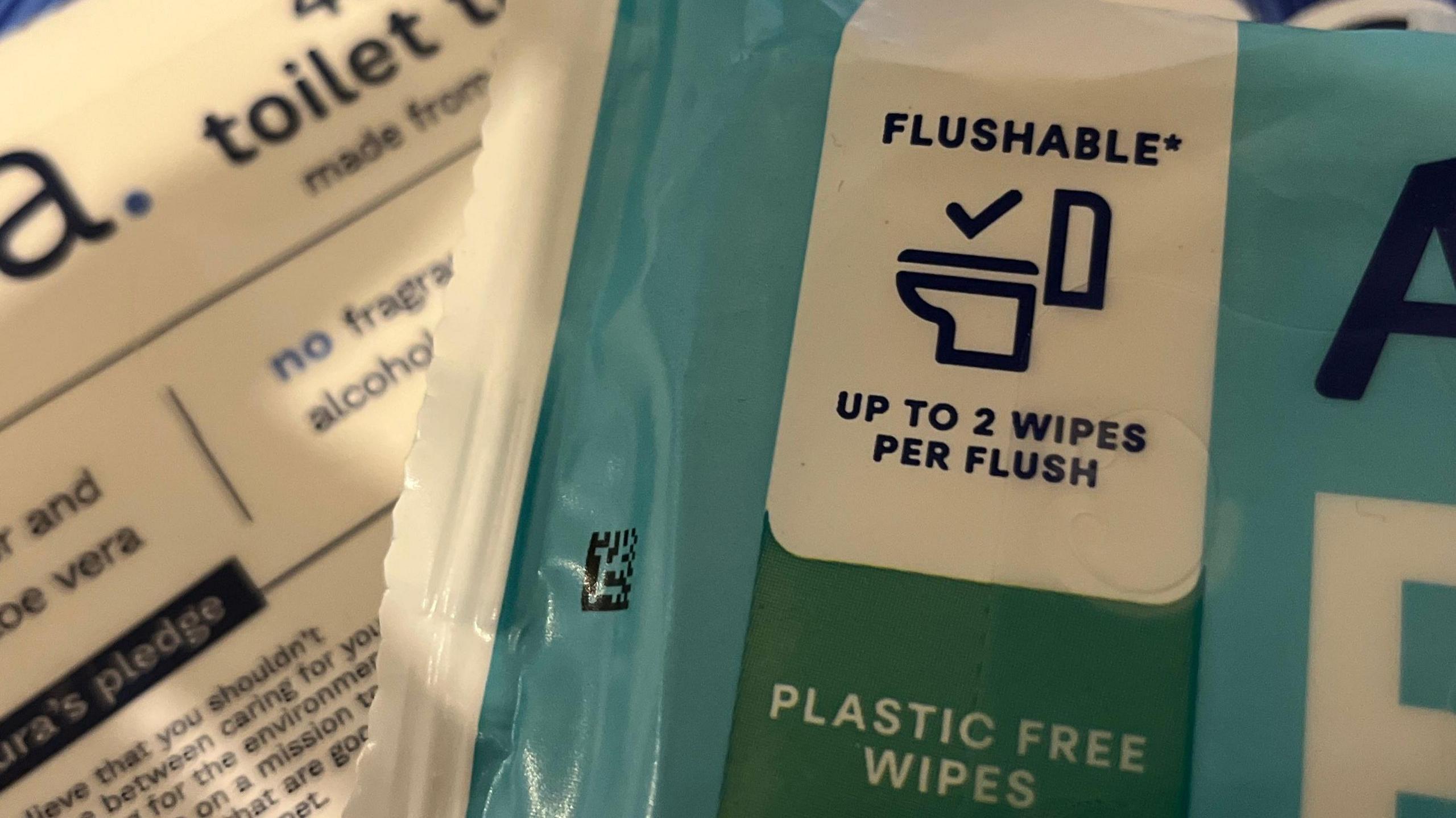 Close up of wet wipe packaging showing that they are labelled "flushable".
