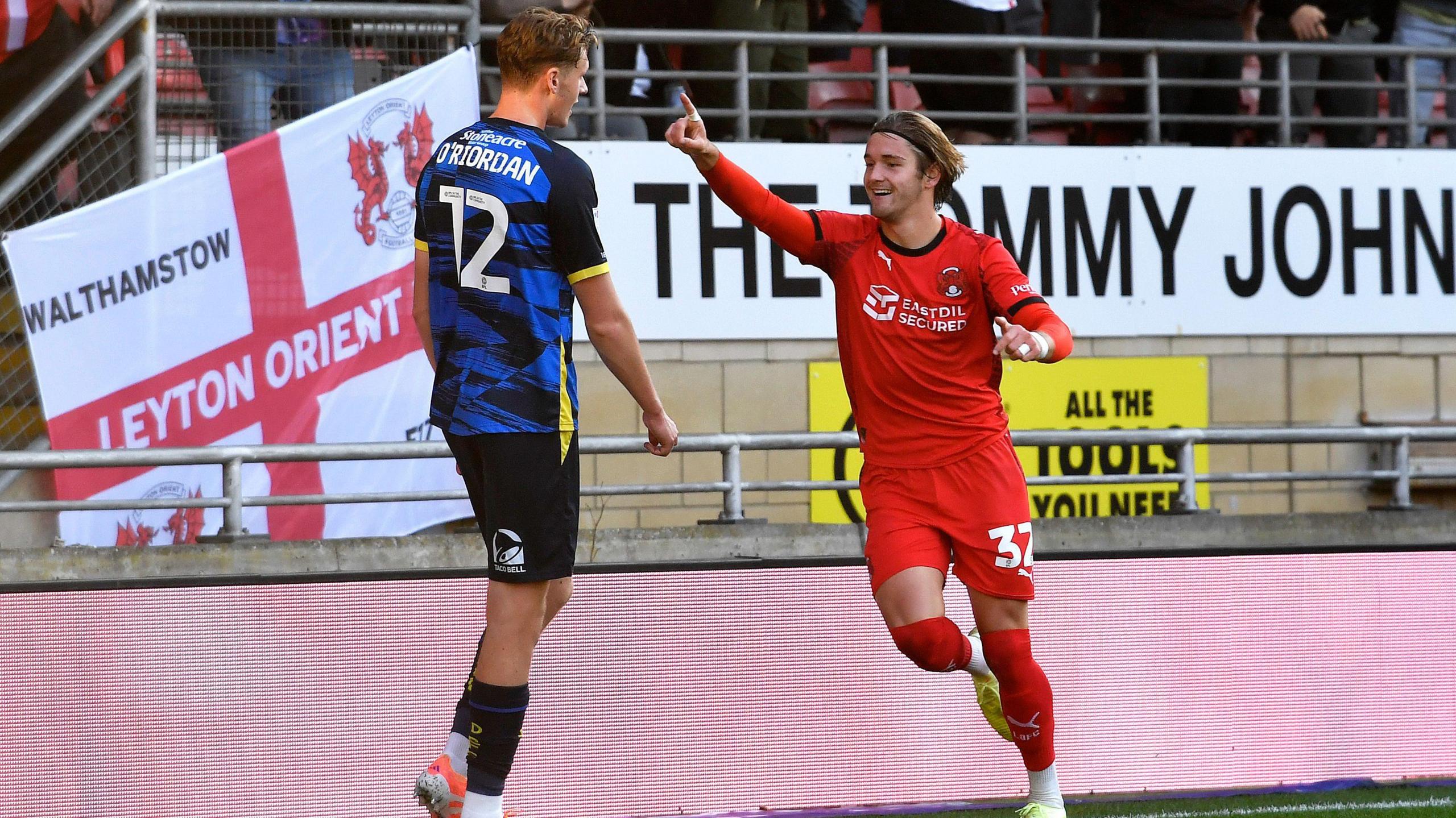 Dom Ballard celebrates in front of the Leyton Orient fans