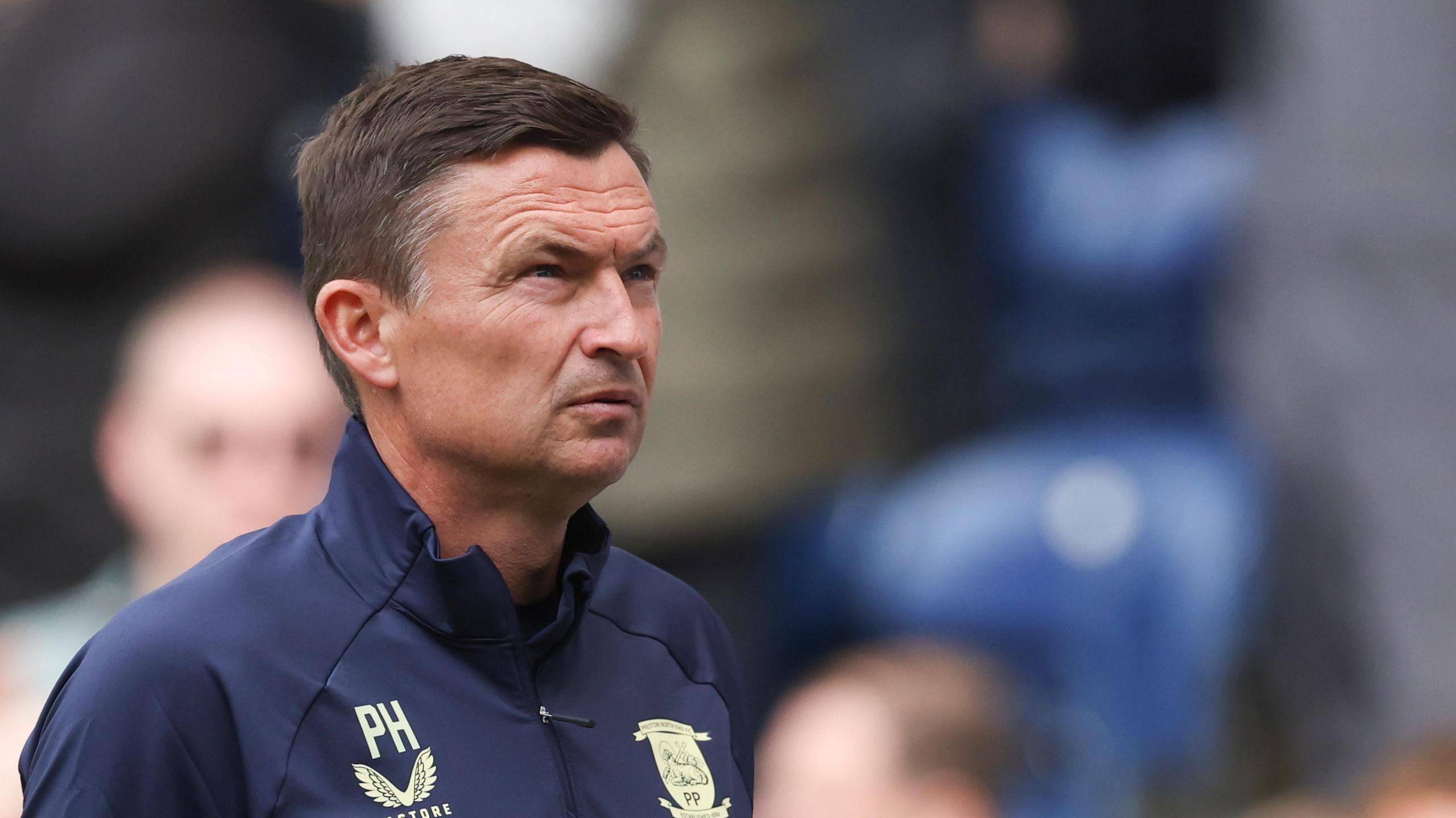 Preston boss Paul Heckinbottom looks on