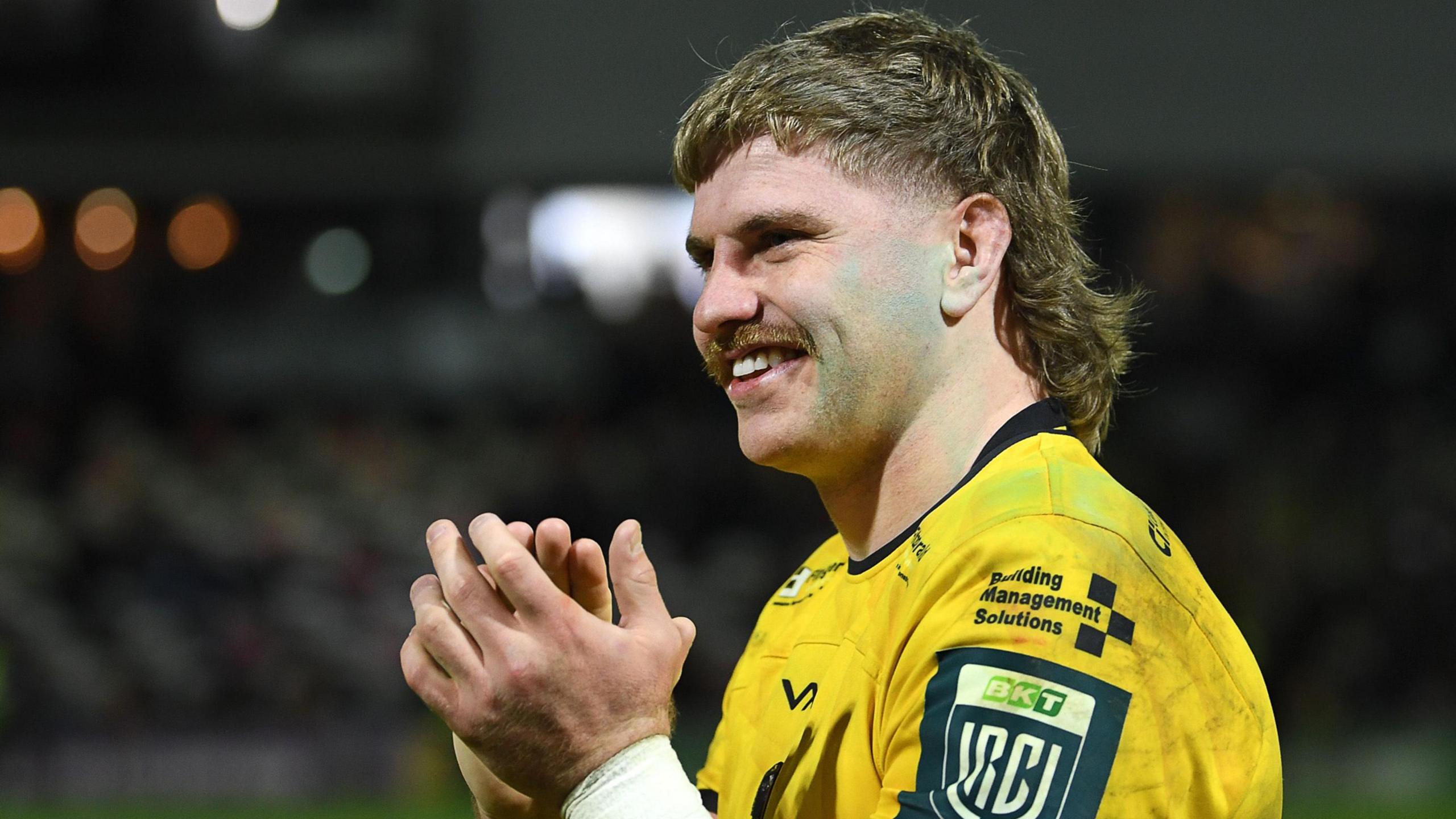 Aaron Wainwright applauds the Dragons fans after victory