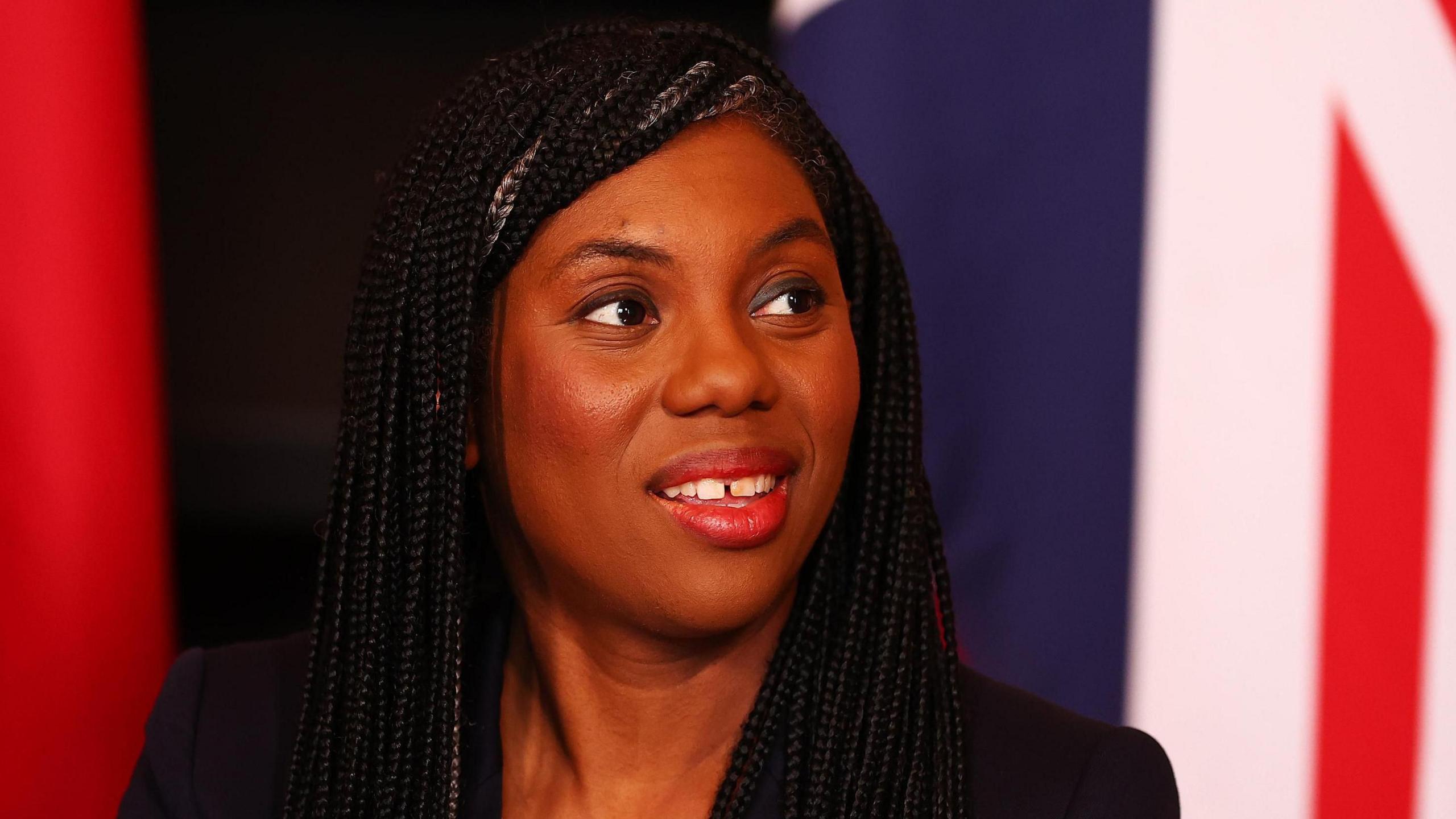 Kemi Badenoch against a union jack backdrop