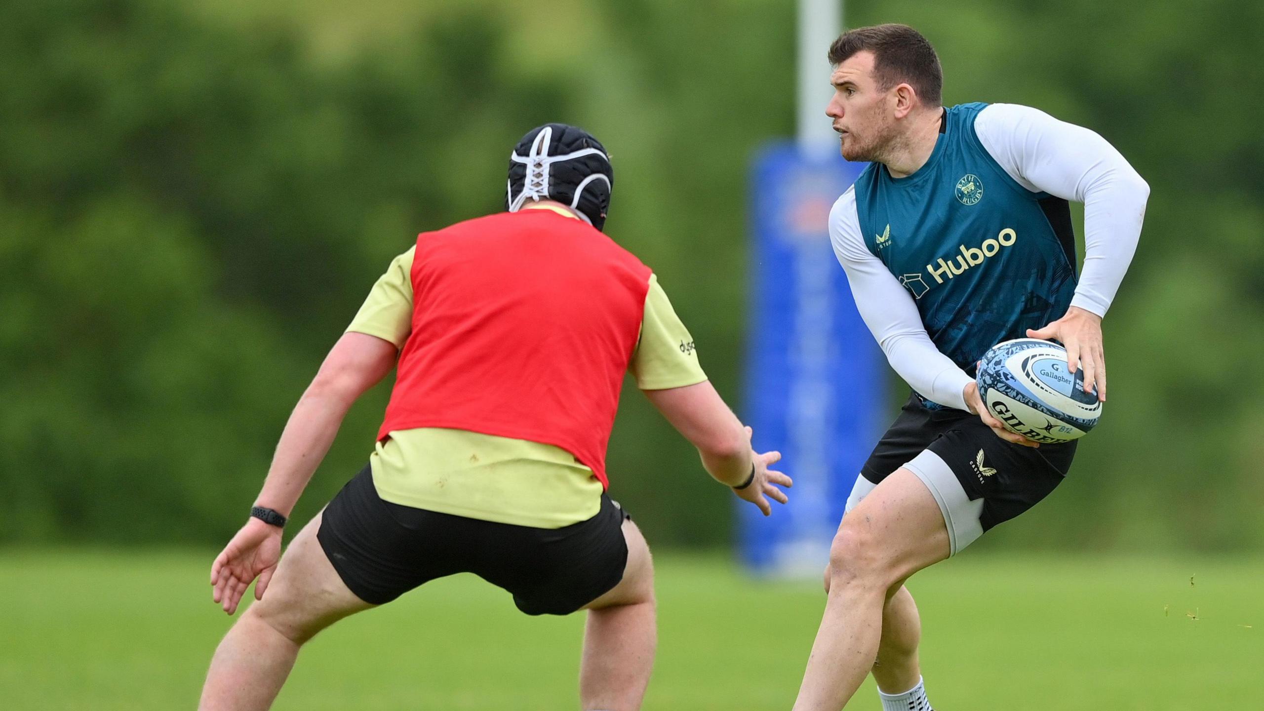 Ben Spencer prepares to throw the ball during a training session