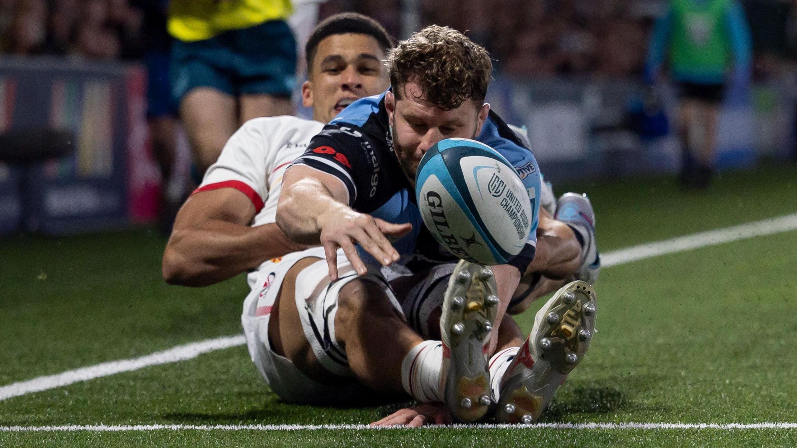 Izuchukwu makes a tackle against Cardiff