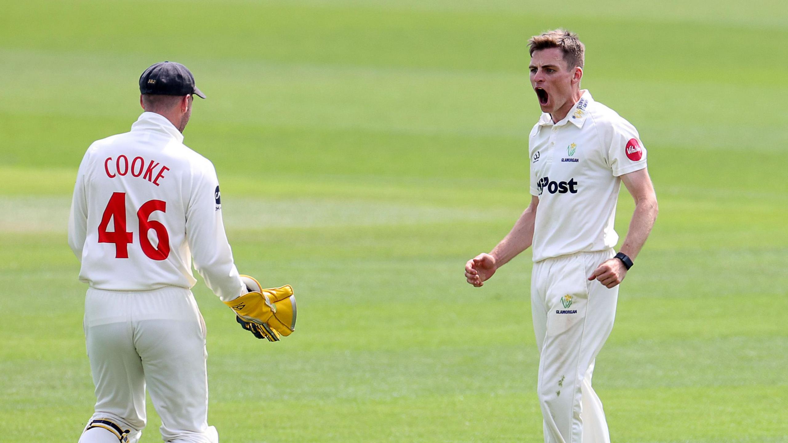 Andy Gorvin (left) celebrates after claiming the wicket of Fynn Hudson-Prentice