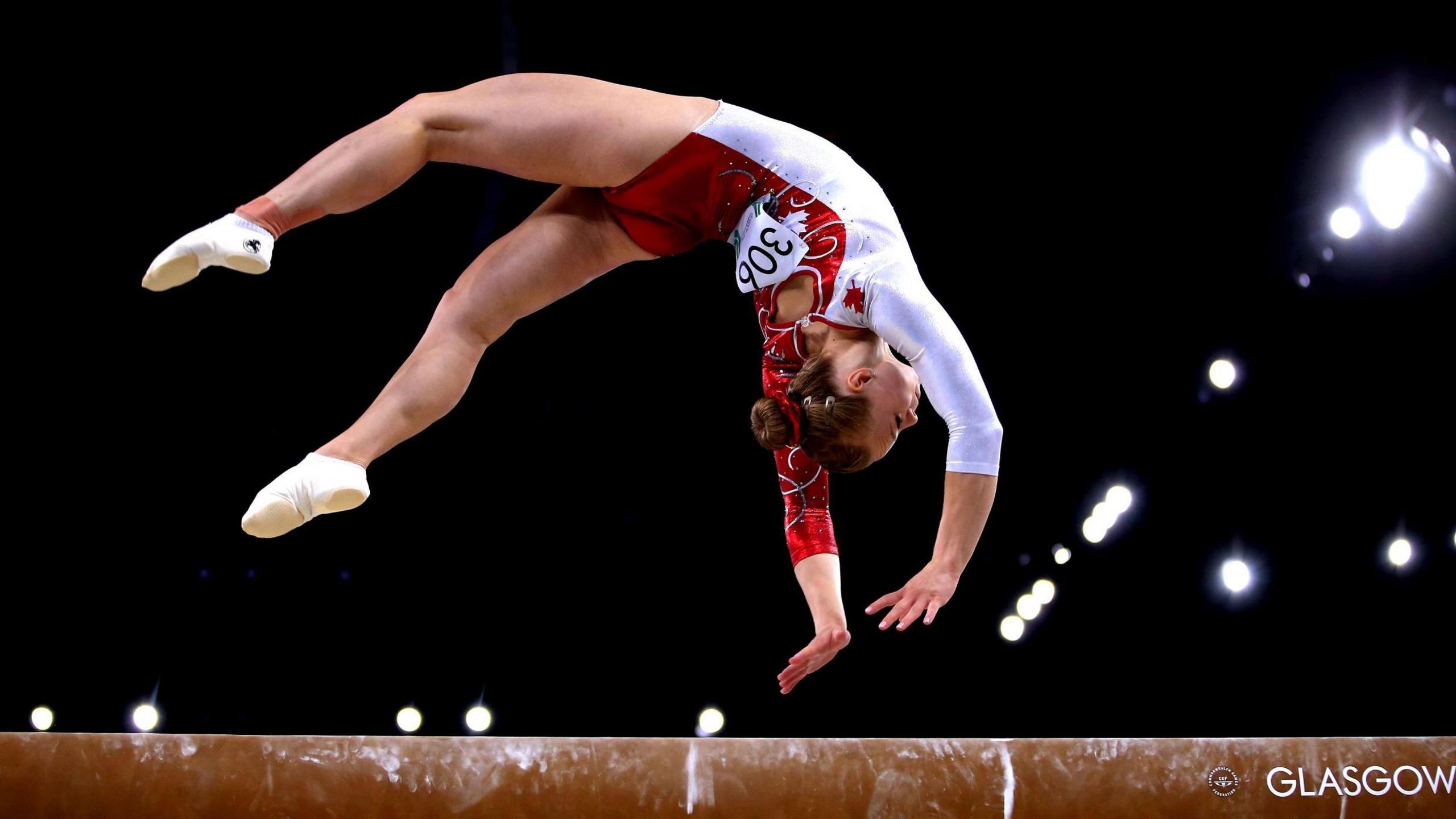 Gold medalist Elsabeth Black of Canada competes in the Women's Beam Final at SSE Hydro during day nine of the Glasgow 2014 Commonwealth Games in August 2014.