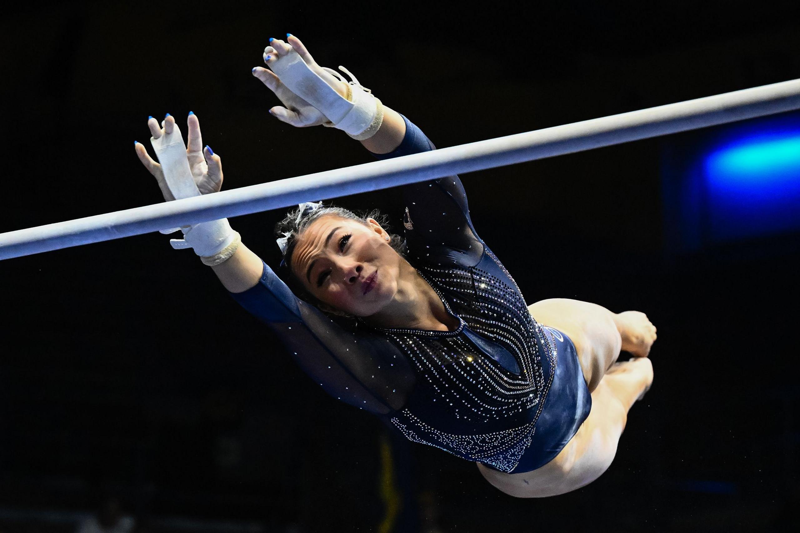 Maddie Williams of the California Golden Bears competes on the uneven bars against the Clemson Tigers at Haas Pavilion in Berkeley, California