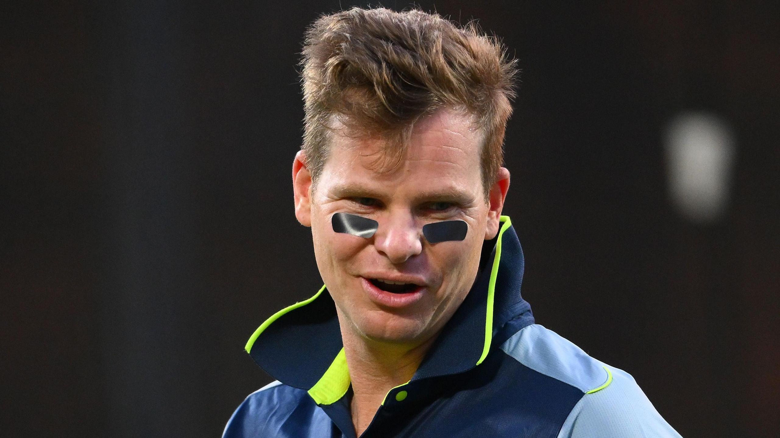 Steve Smith with black tape under his eyes