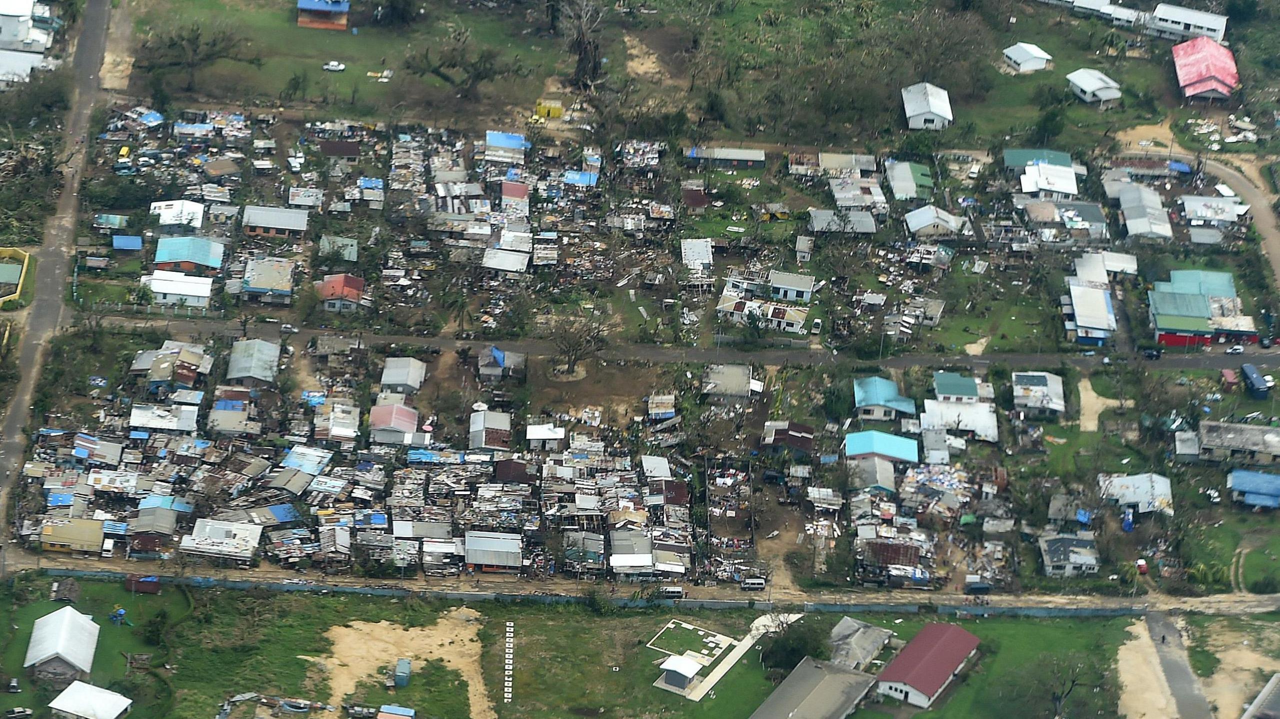 Houses destroyed in the wake of a major cyclone that hit Vanuatu