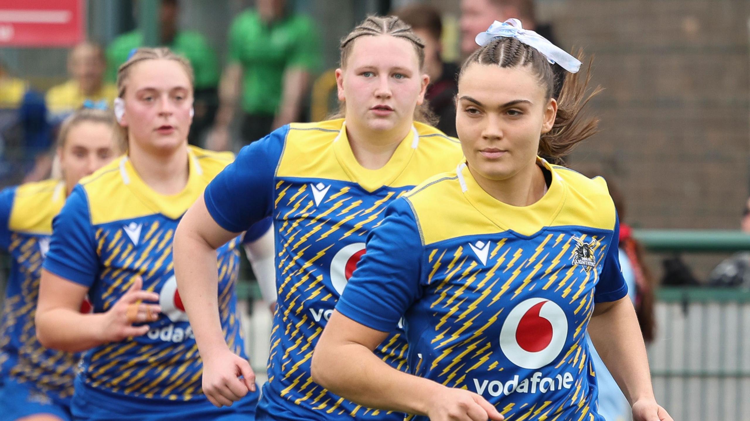 Gwalia Lightning captain Bryonie King leads the team out