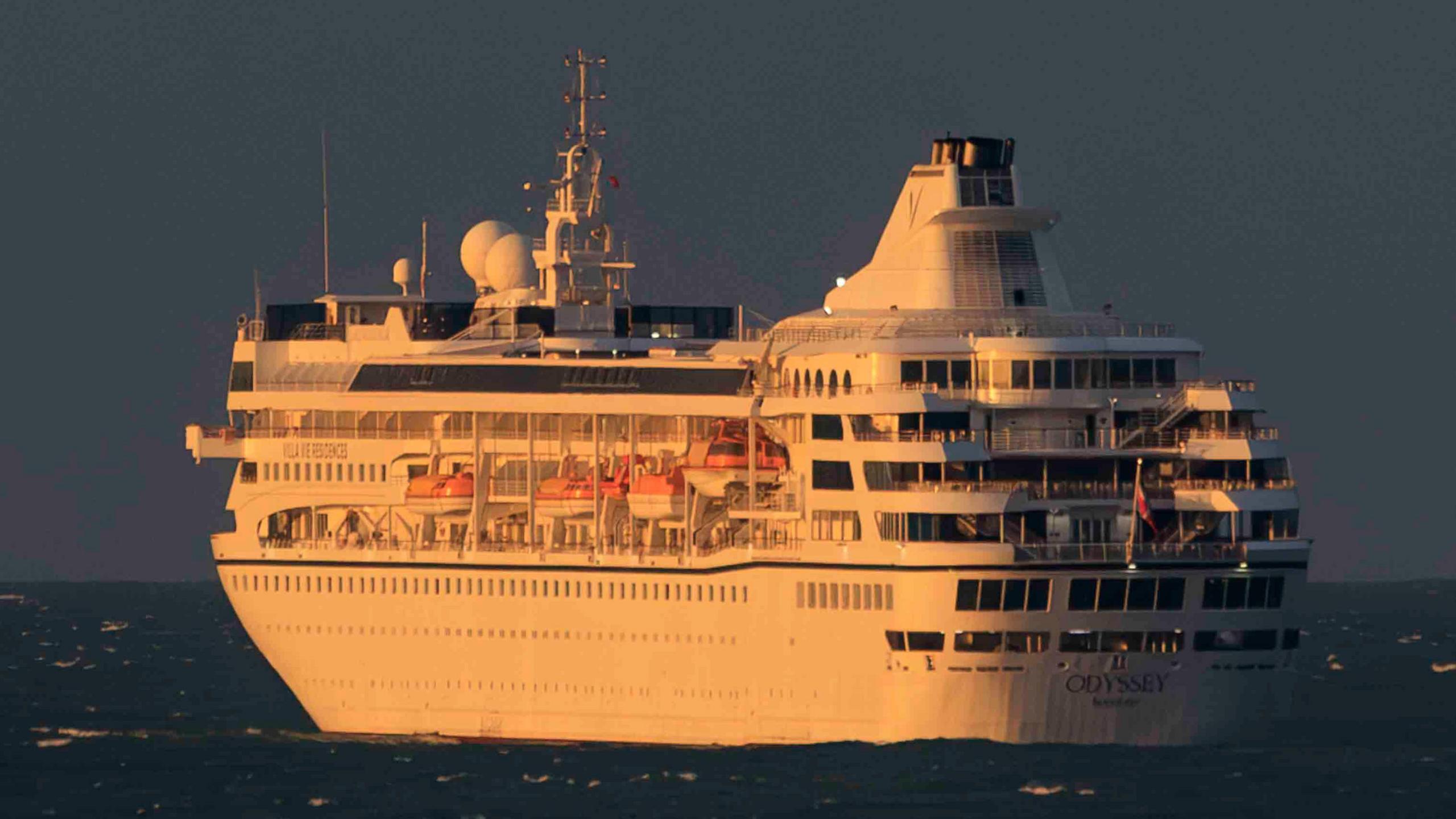 The Villa Vie Odyssey cruise ship docked in the sea off the coast