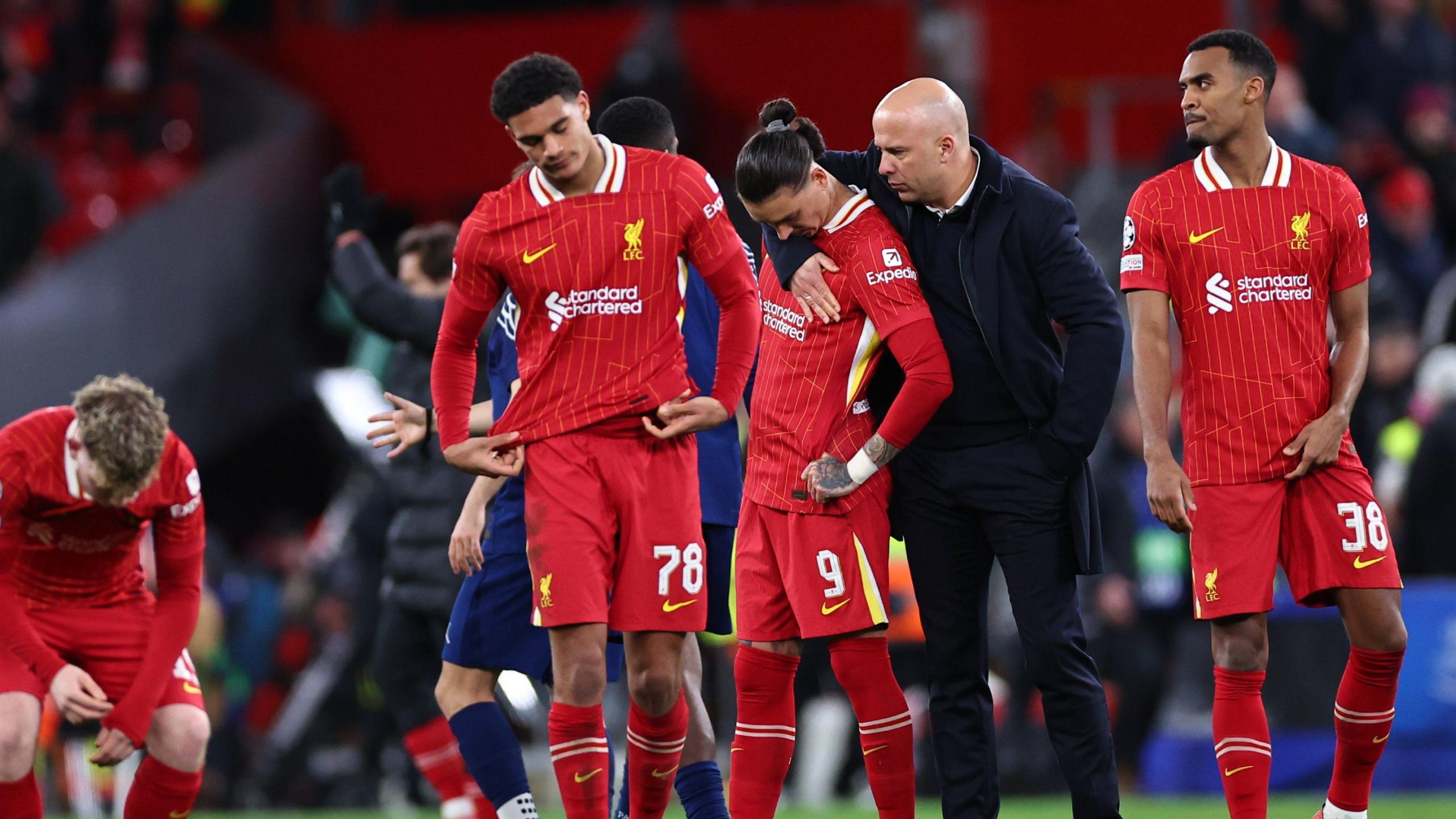 Darwin Nunez is consoled by Liverpool manager Arne Slot after his penalty miss