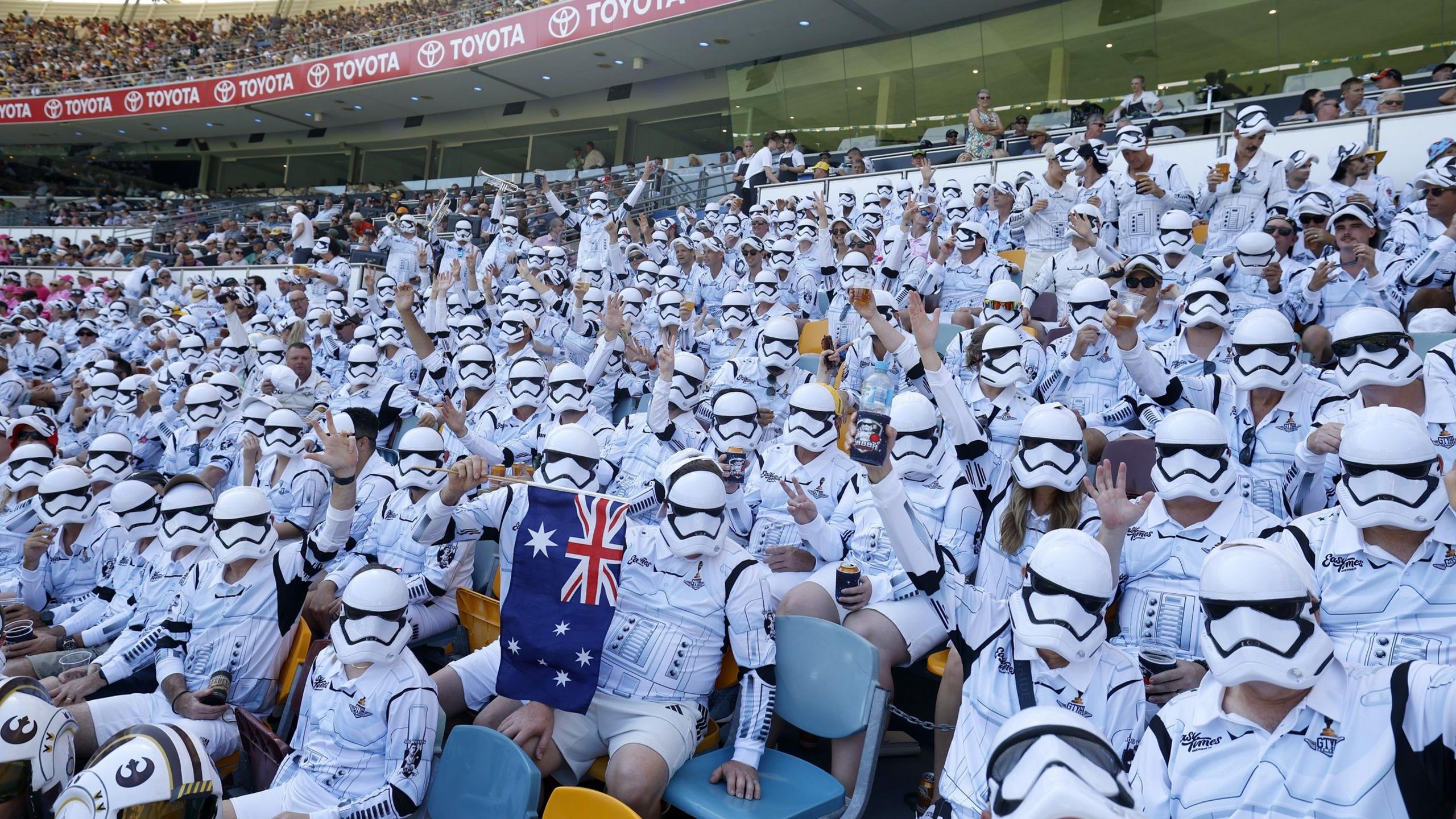 Spectators dressed as stormtroopers