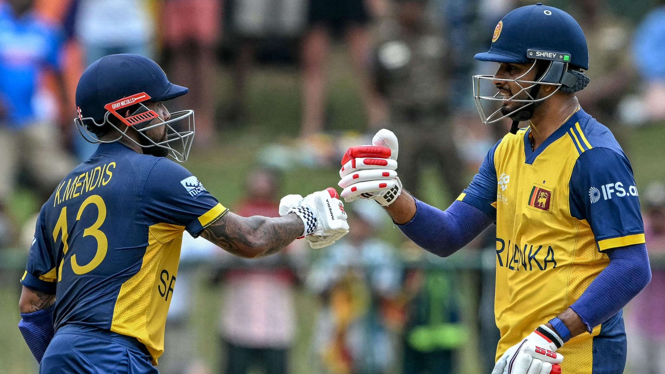  Kusal Mendis and Sri Lanka captain Dasun Shanaka bump fists 