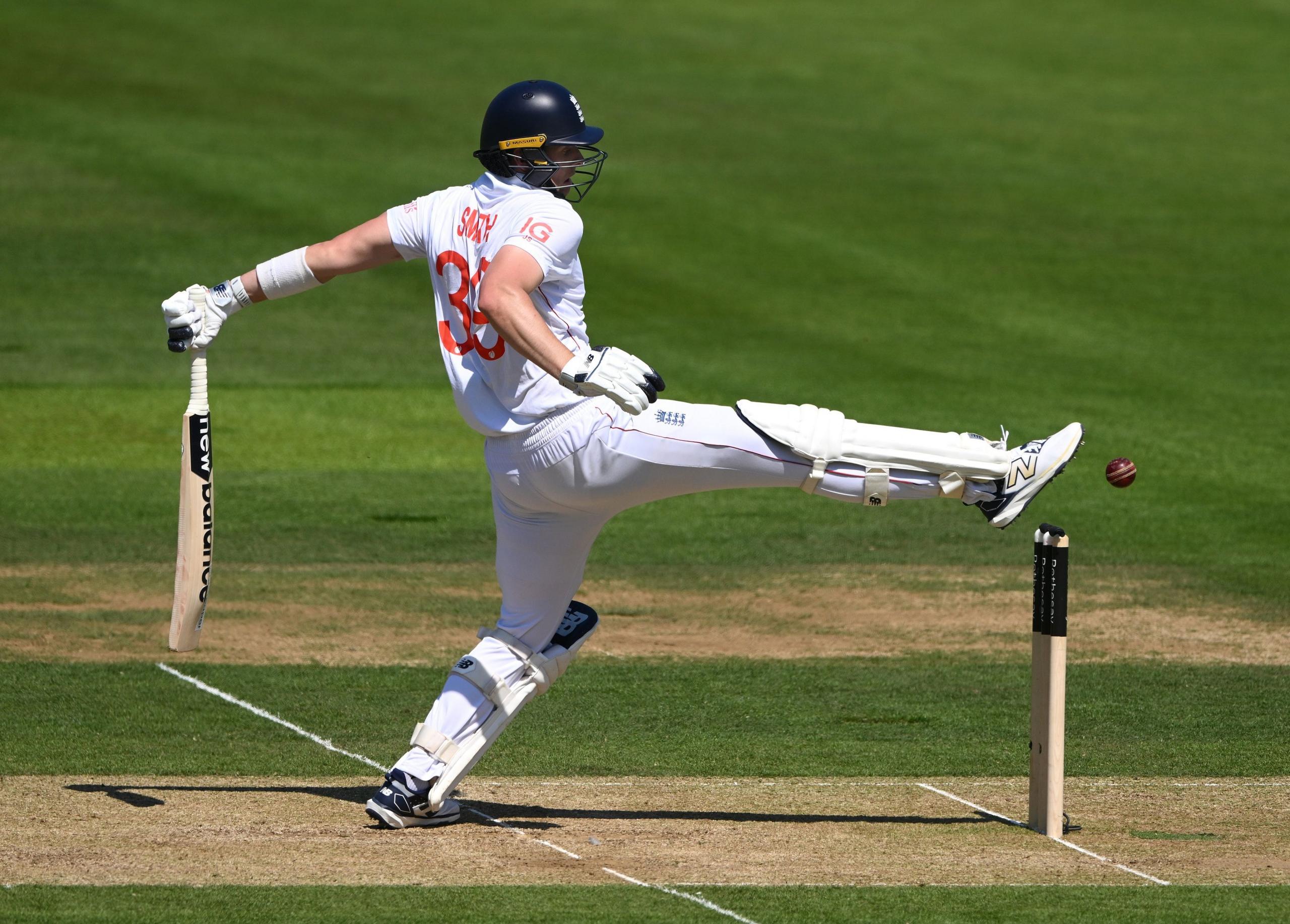 England's Jamie Smith attempts to stop the ball hitting his stumps with his foot in the third Test against India at Lord's