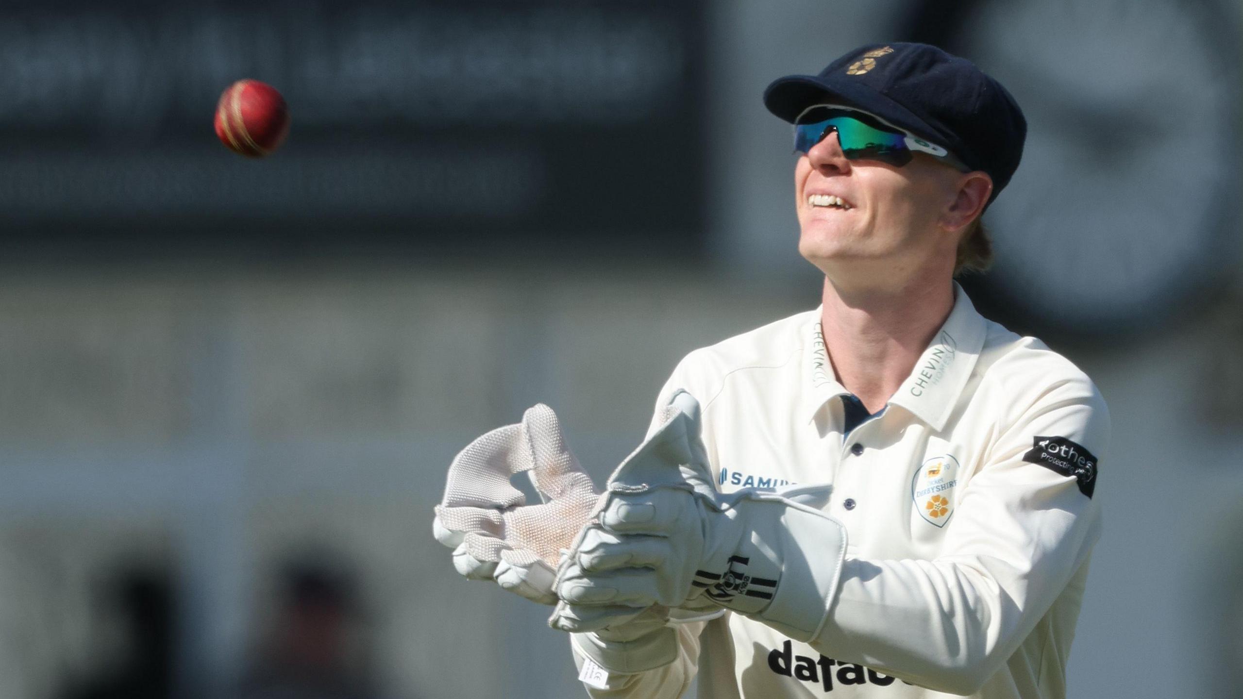 Derbyshire's Brooke Guest catches the ball