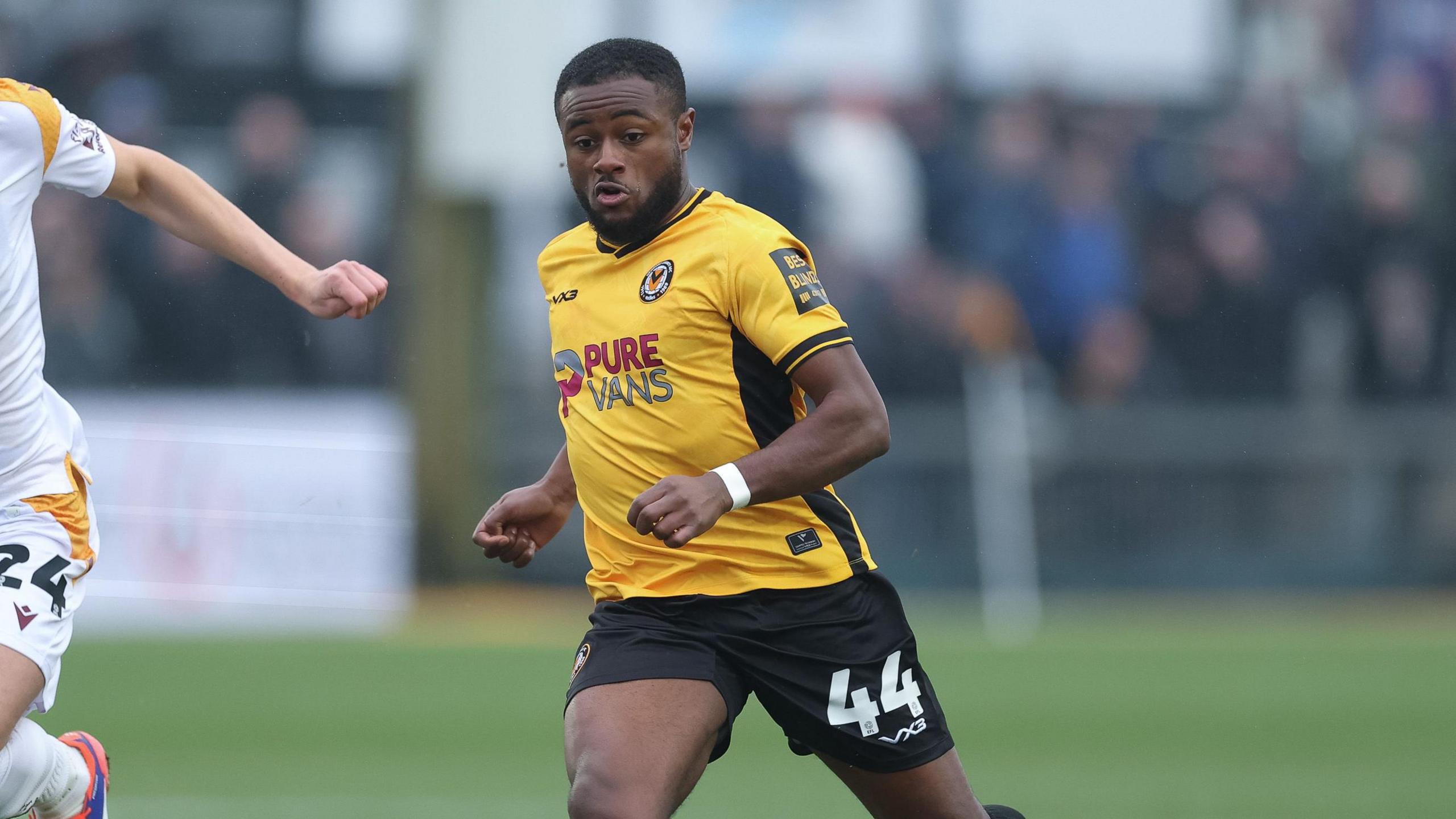 David Ajiboye of Newport County presses forward 