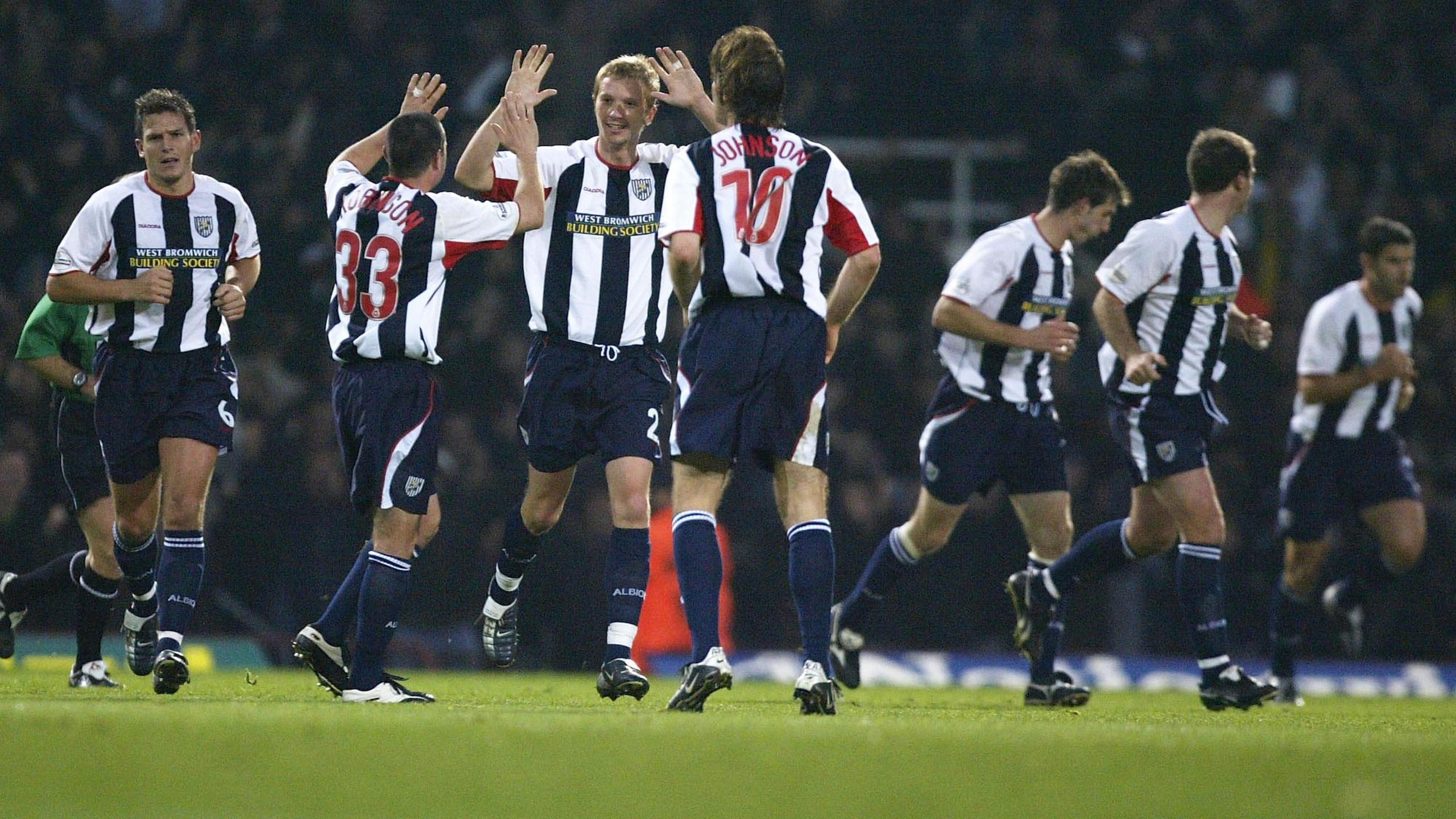 West Brom players celebrate scoring in the 4-3 win over West Ham at Upton Park on 8 November 2003