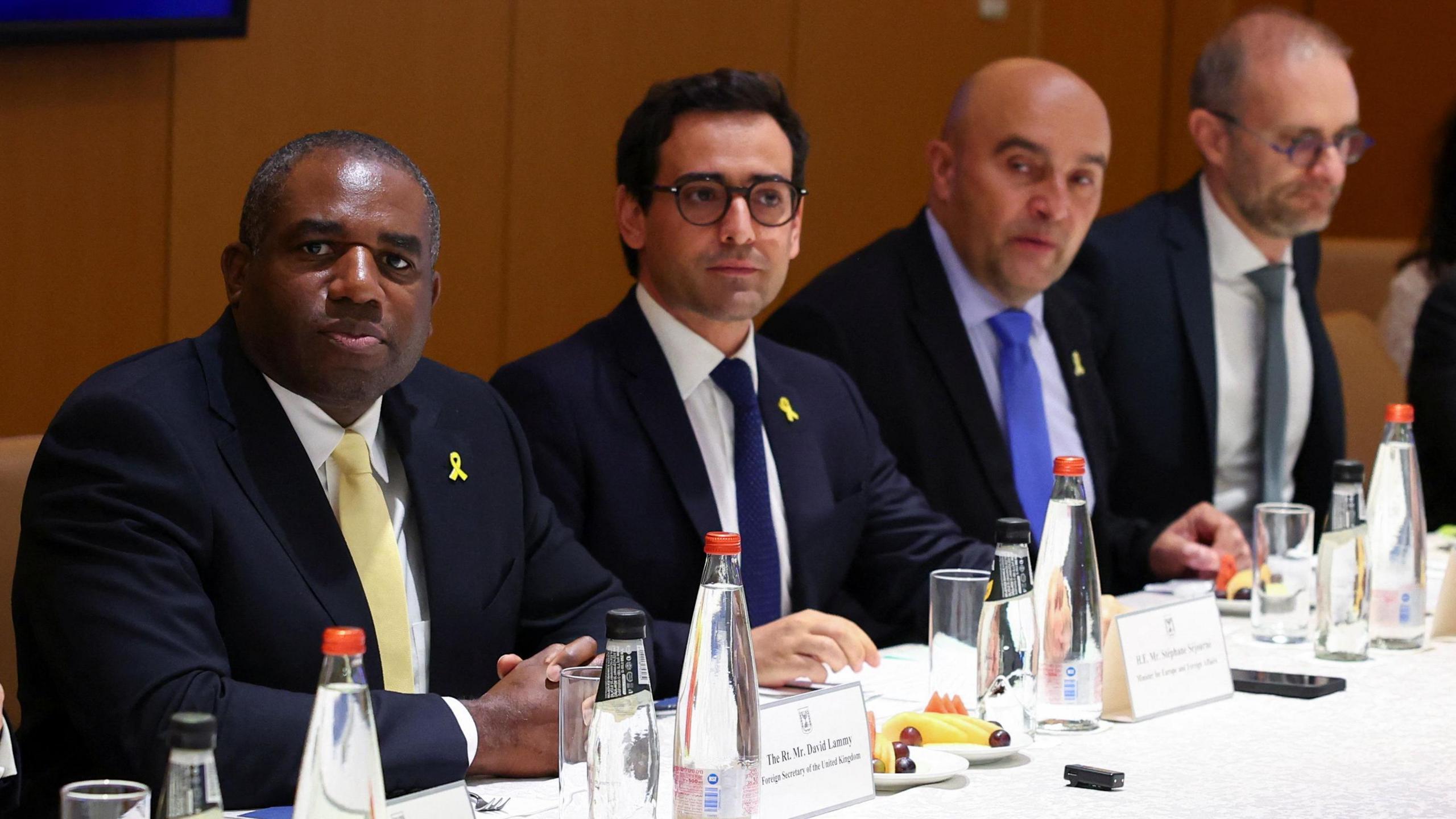 Britain's Foreign Secretary David Lammy and French Foreign Minister Stephane Sejourne attend a meeting with Israeli Foreign Minister Israel Katz (not pictured) in Jerusalem