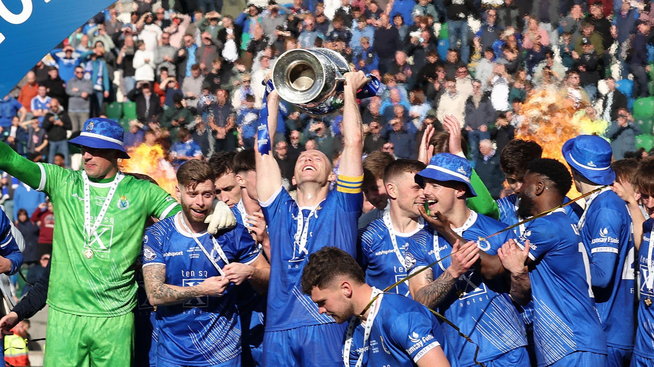 Dungannon celebrate winning last year's Irish Cup