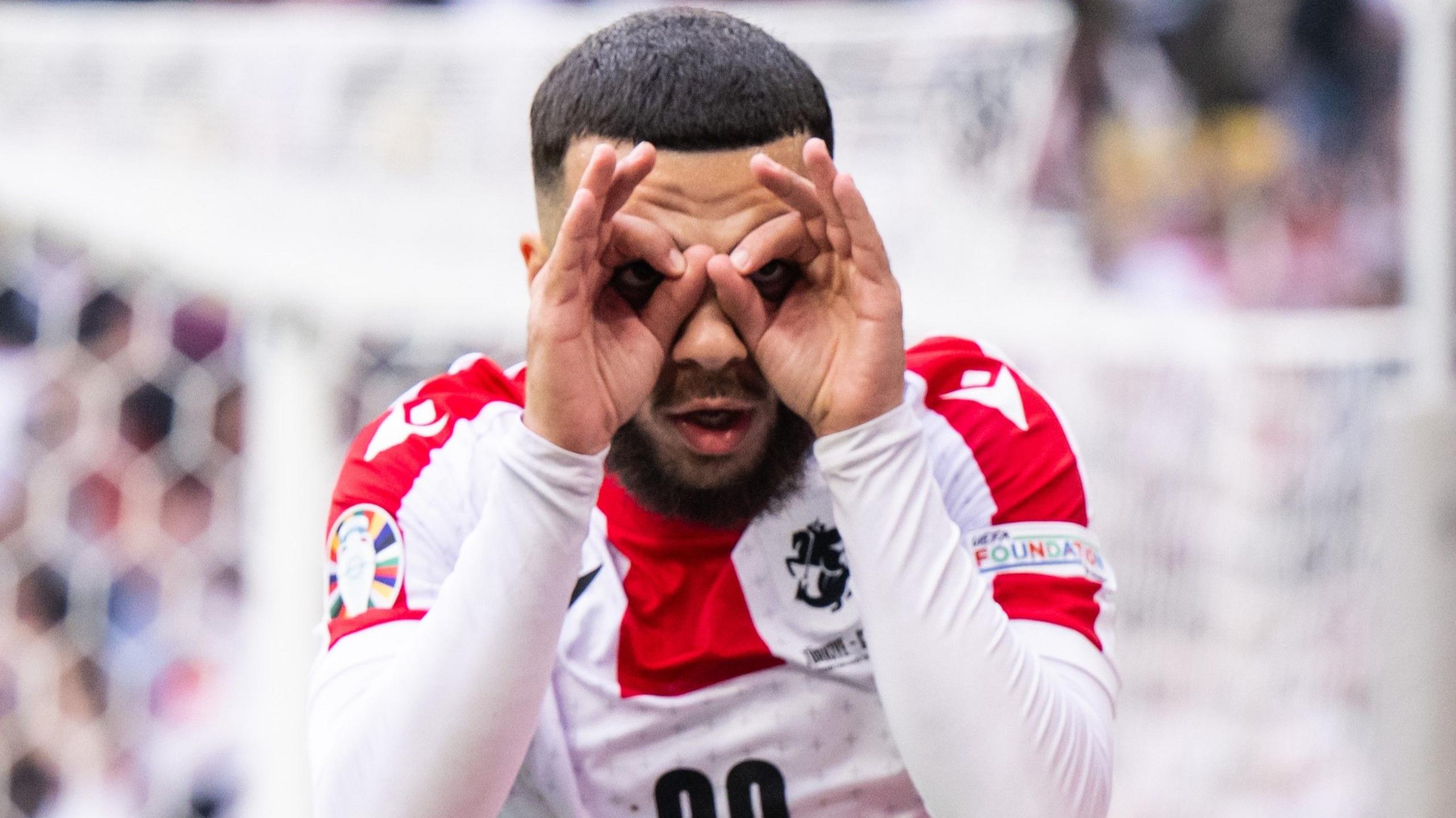 Georges Mikautadze celebrates a goal for Georgia at Euro 2024