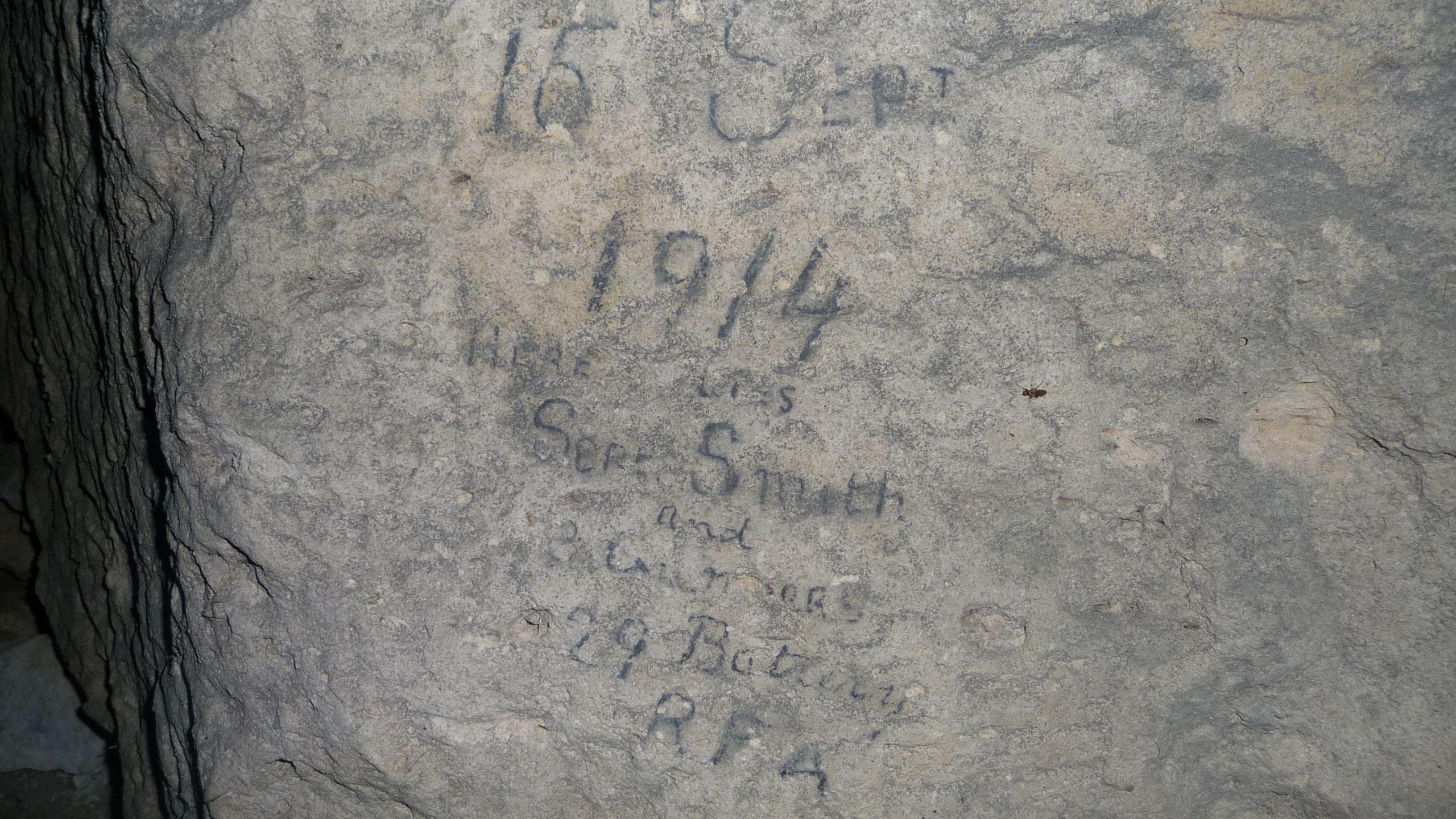 Scrawlings in a cave which read "15 Sept 1914, Here lies Sjt Smith and 3 Gnrs, 29th Battery RFA"