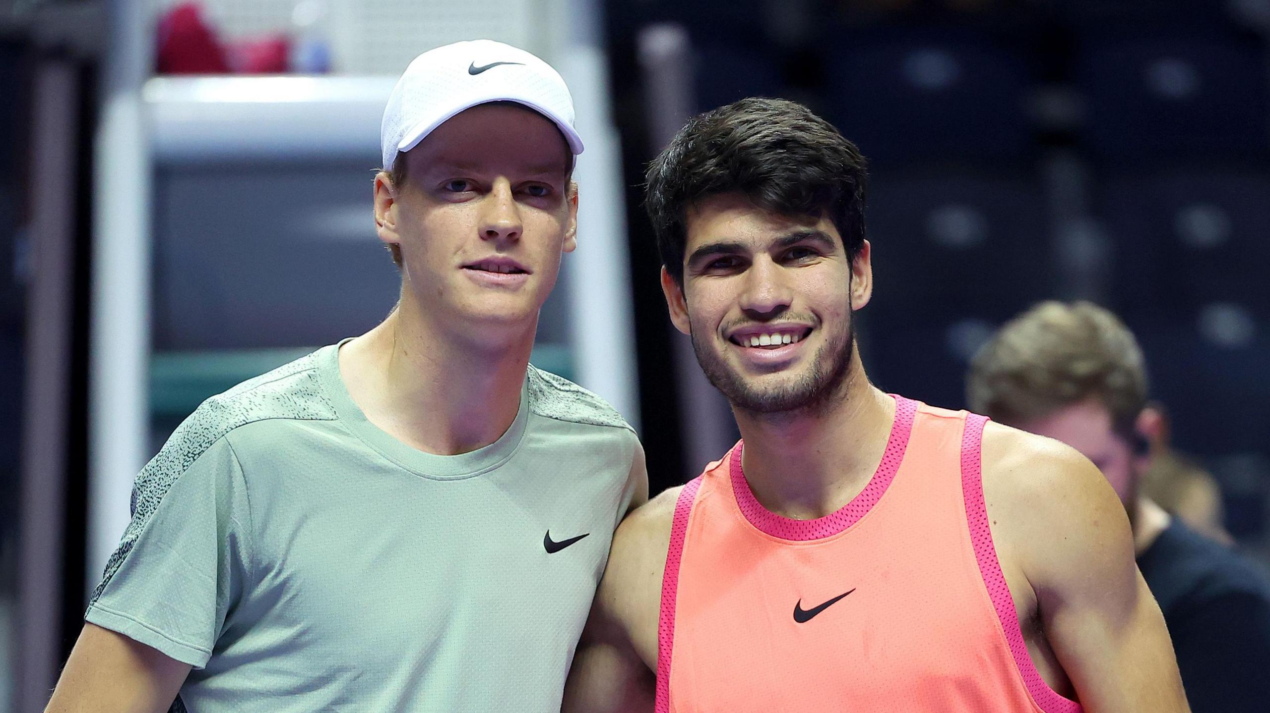 Jannik Sinner and Carlos Alcaraz pose together for a pre-match photograph