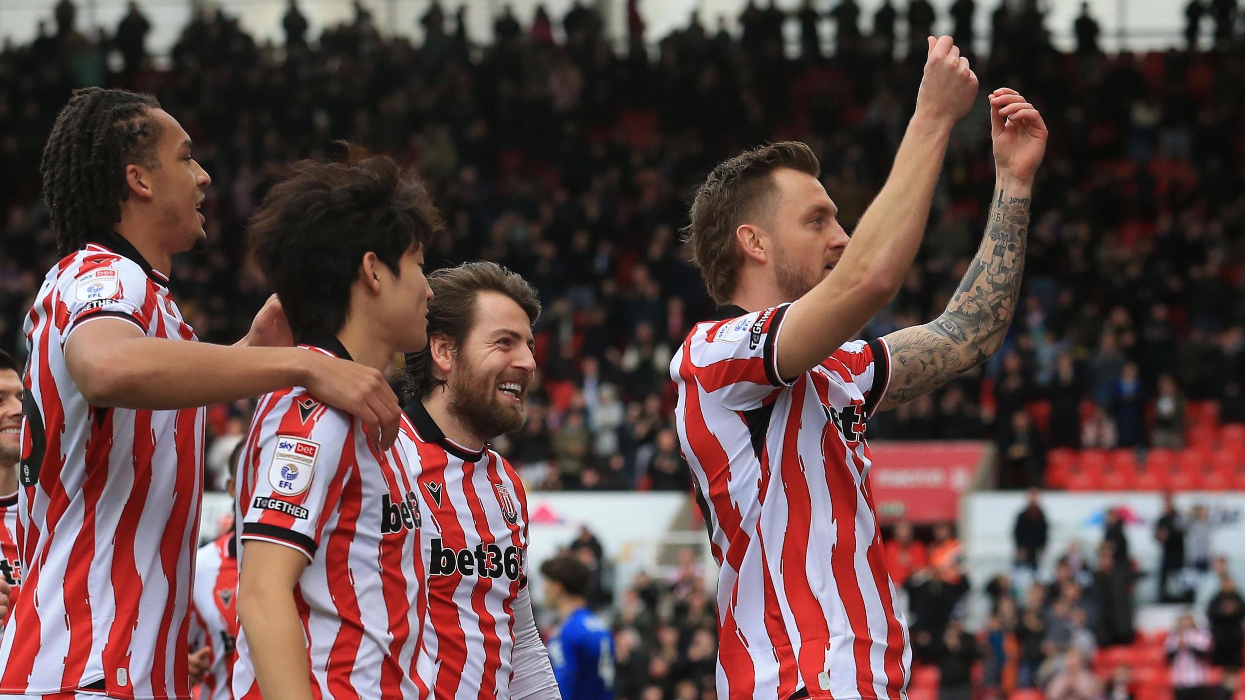 Stoke City players celebrate Ben Wilmot's first-half goal against Leicester City