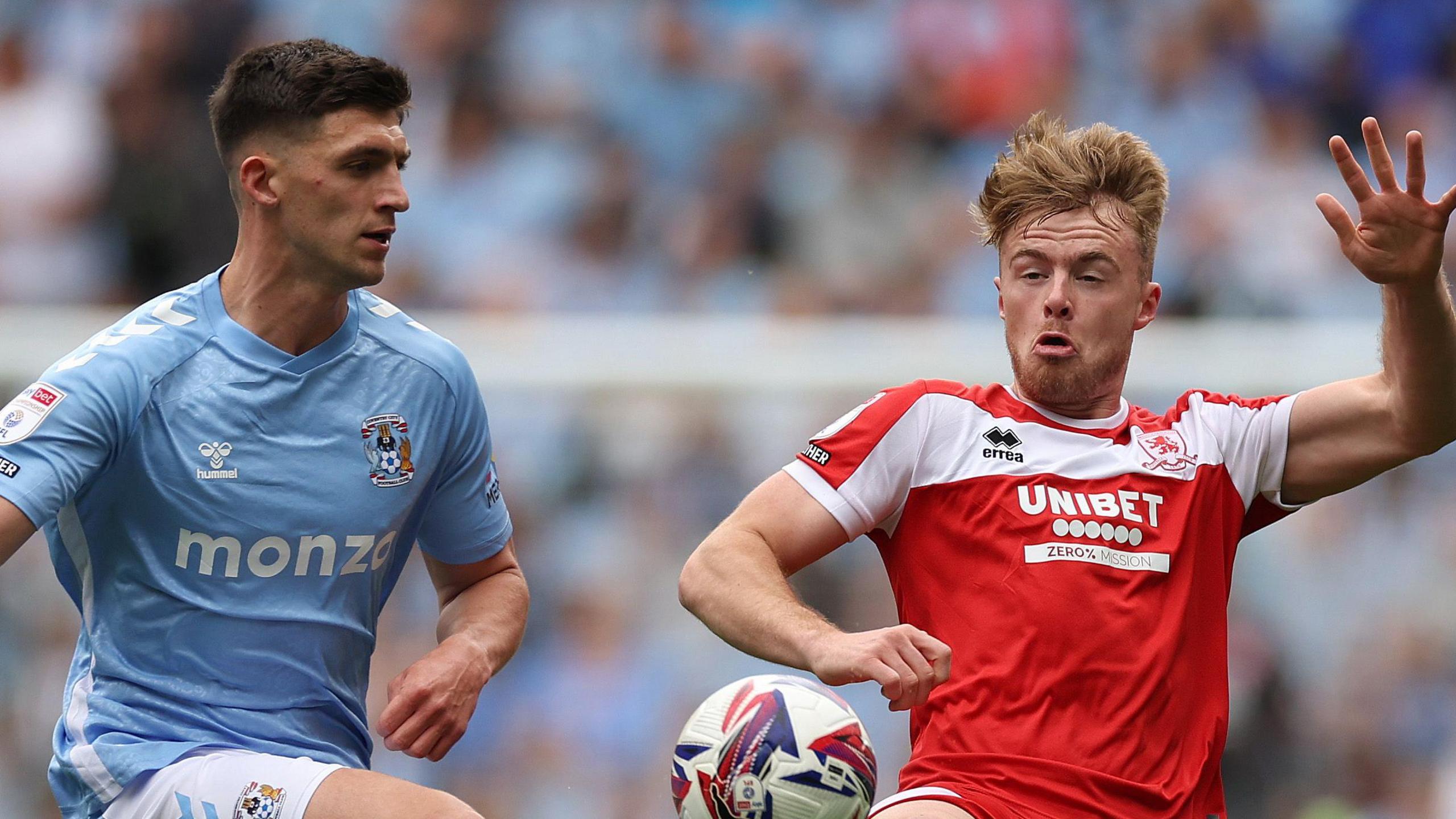 Coventry defender Bobby Thomas (left) gets to the ball just ahead of Middlesbrough forward Tommy Conway 