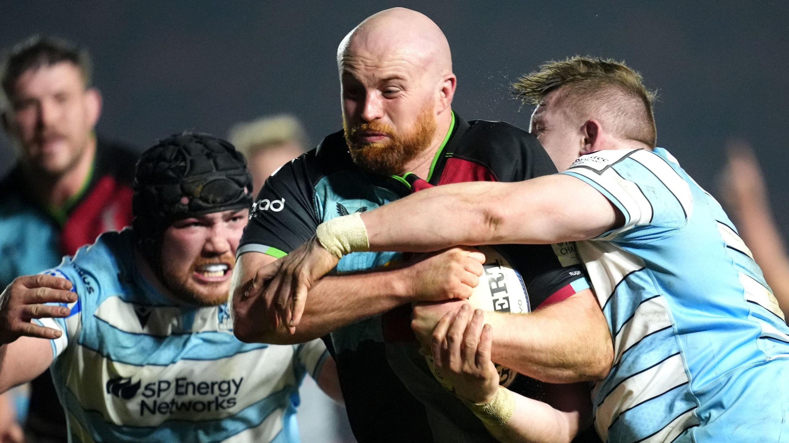 James Chisholm scoring Harlequins' second try with a powerful run