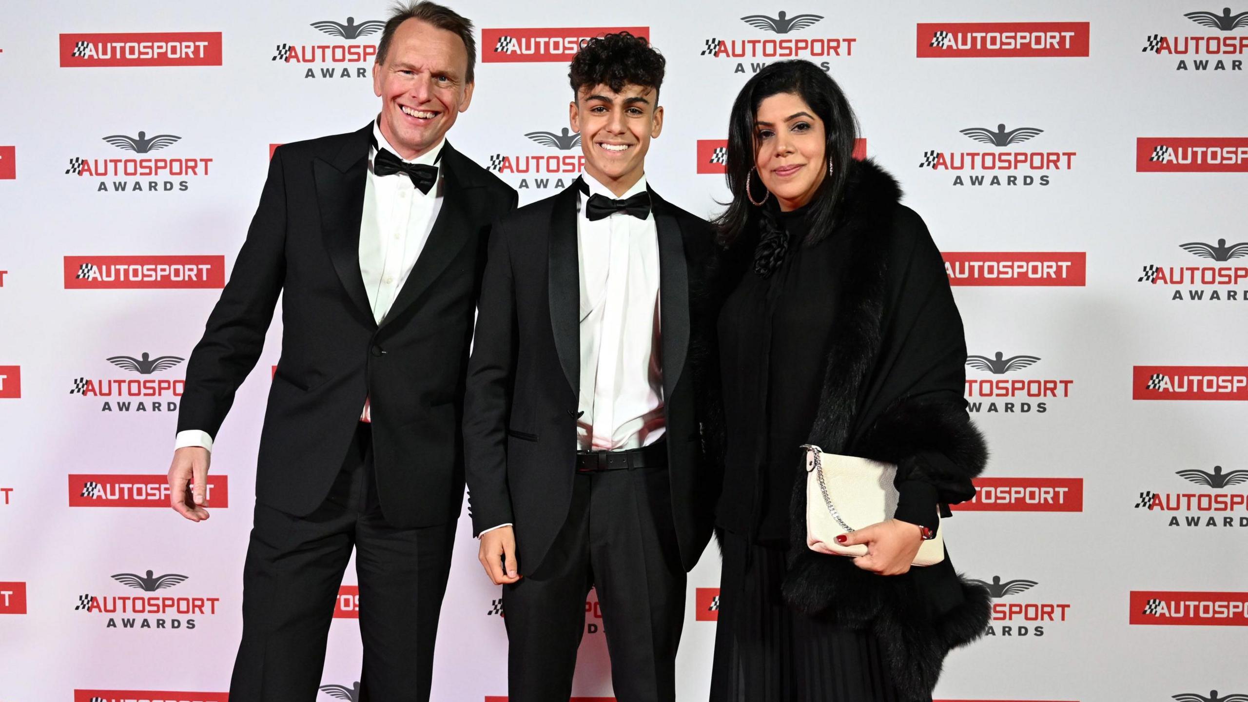 Arvid Lindblad pictured with his dad, Stefan, and his mum Anita, at the Autosport Awards in 2023