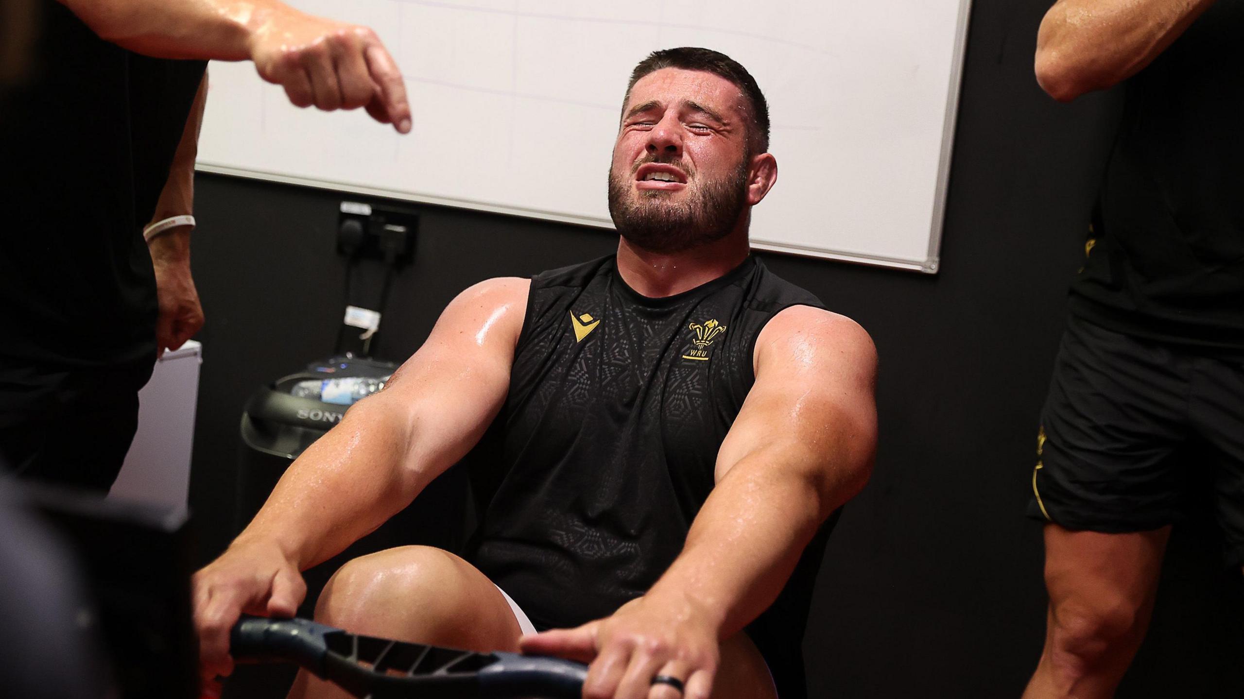Gareth Thomas using a rowing machine in training