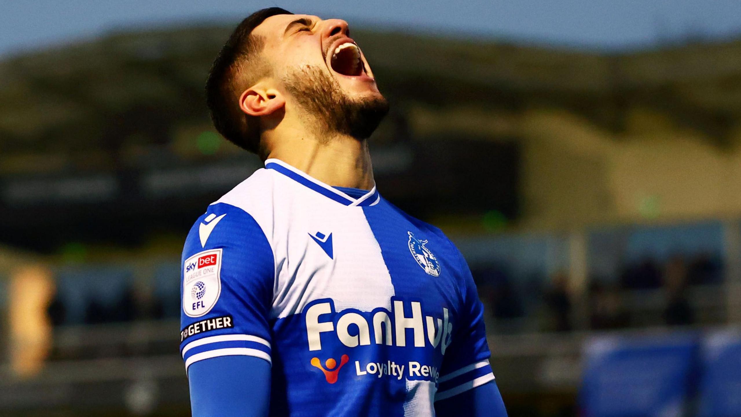 Ruel Sotiriou celebrates after scoring against Barnsley