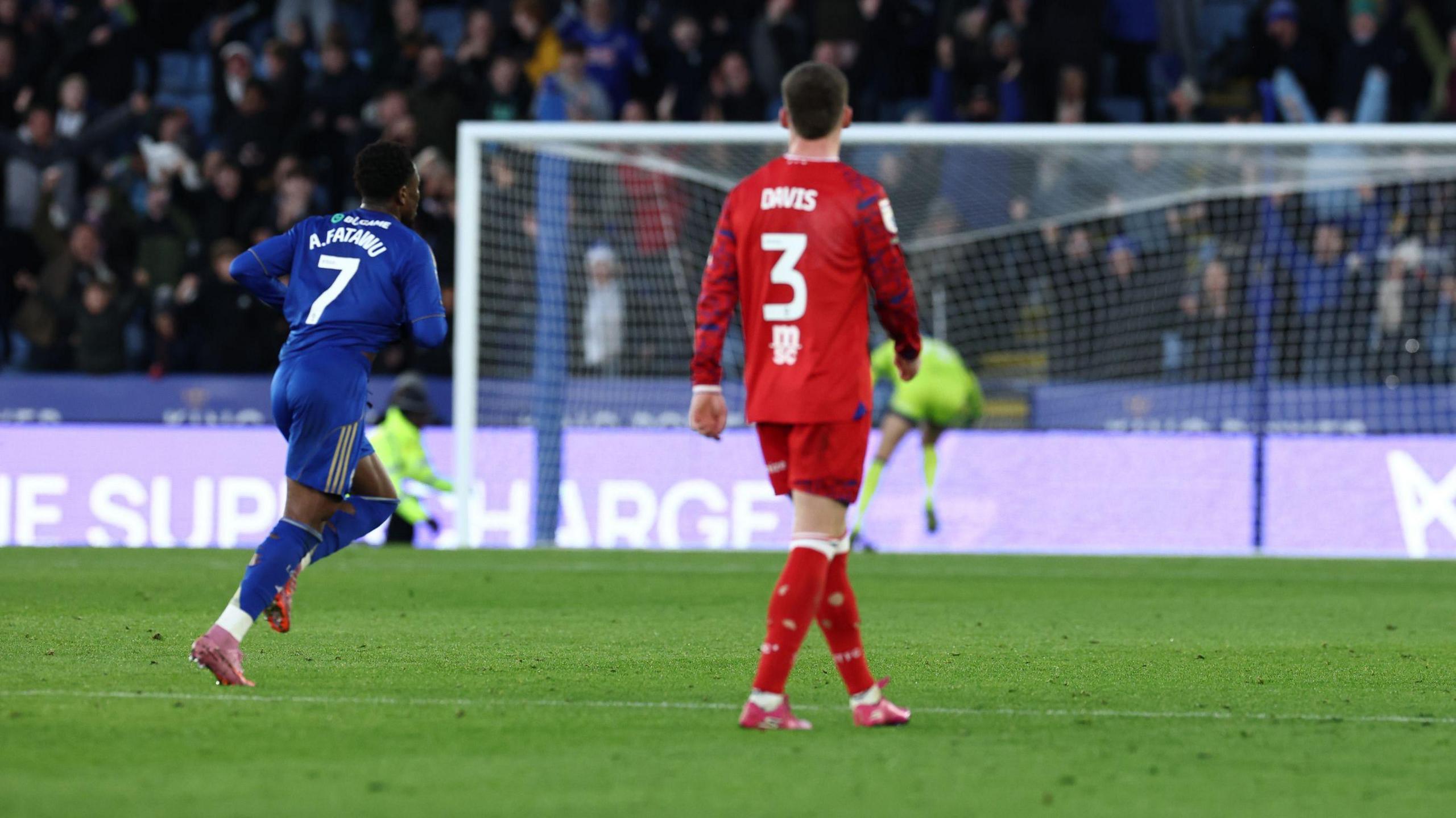 Leicester's Abdul Fatawu runs away to celebrate after scoring from his own half against Ipswich