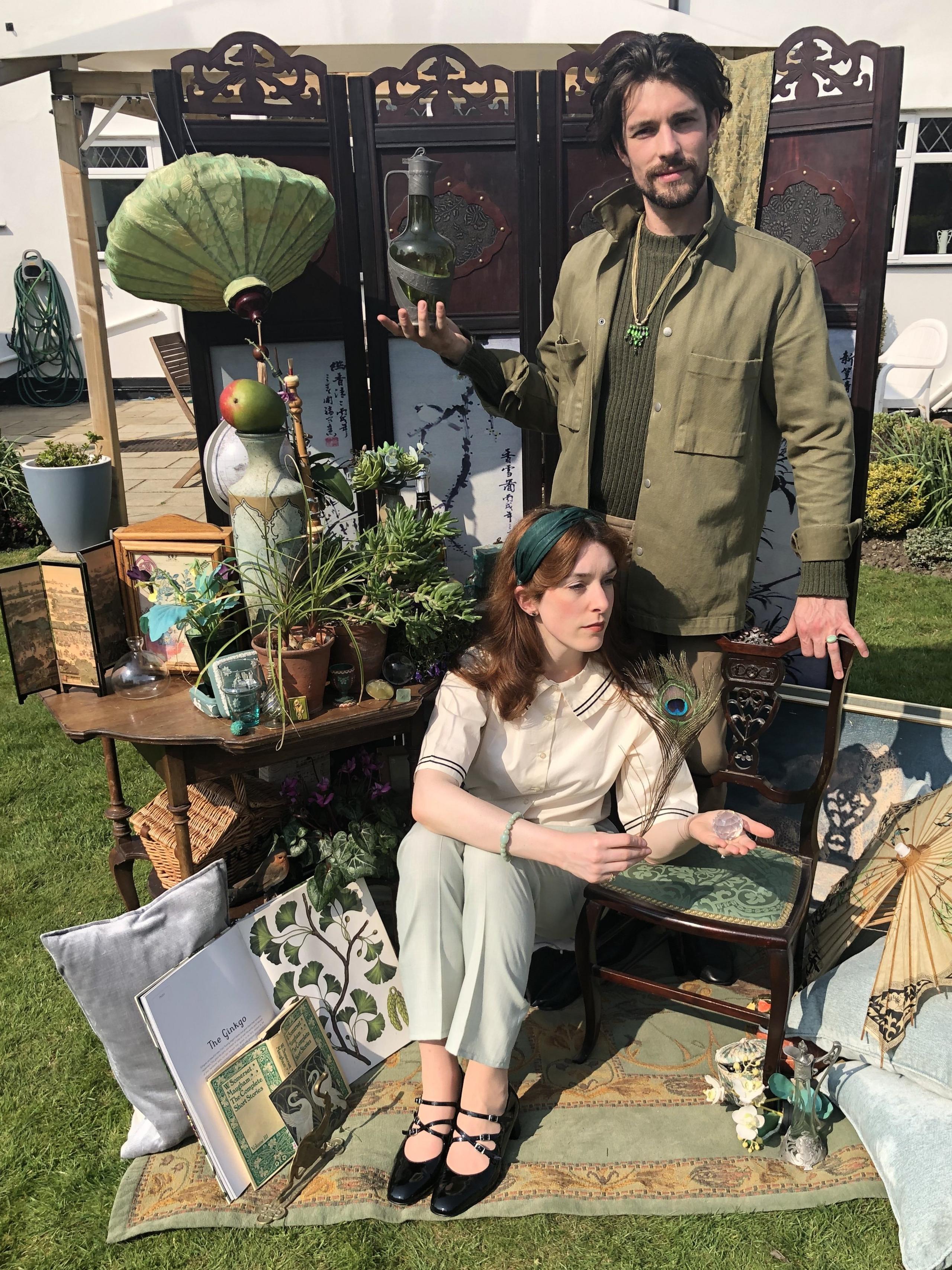 Helen Yang and Thomas Etheridge in green outfits