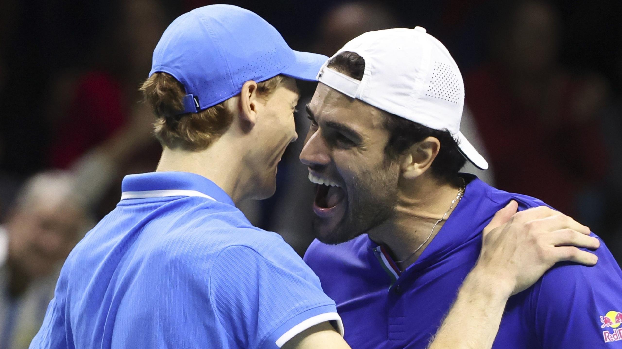 Jannik Sinner and Matteo Berrettini celebrate Italy's victory