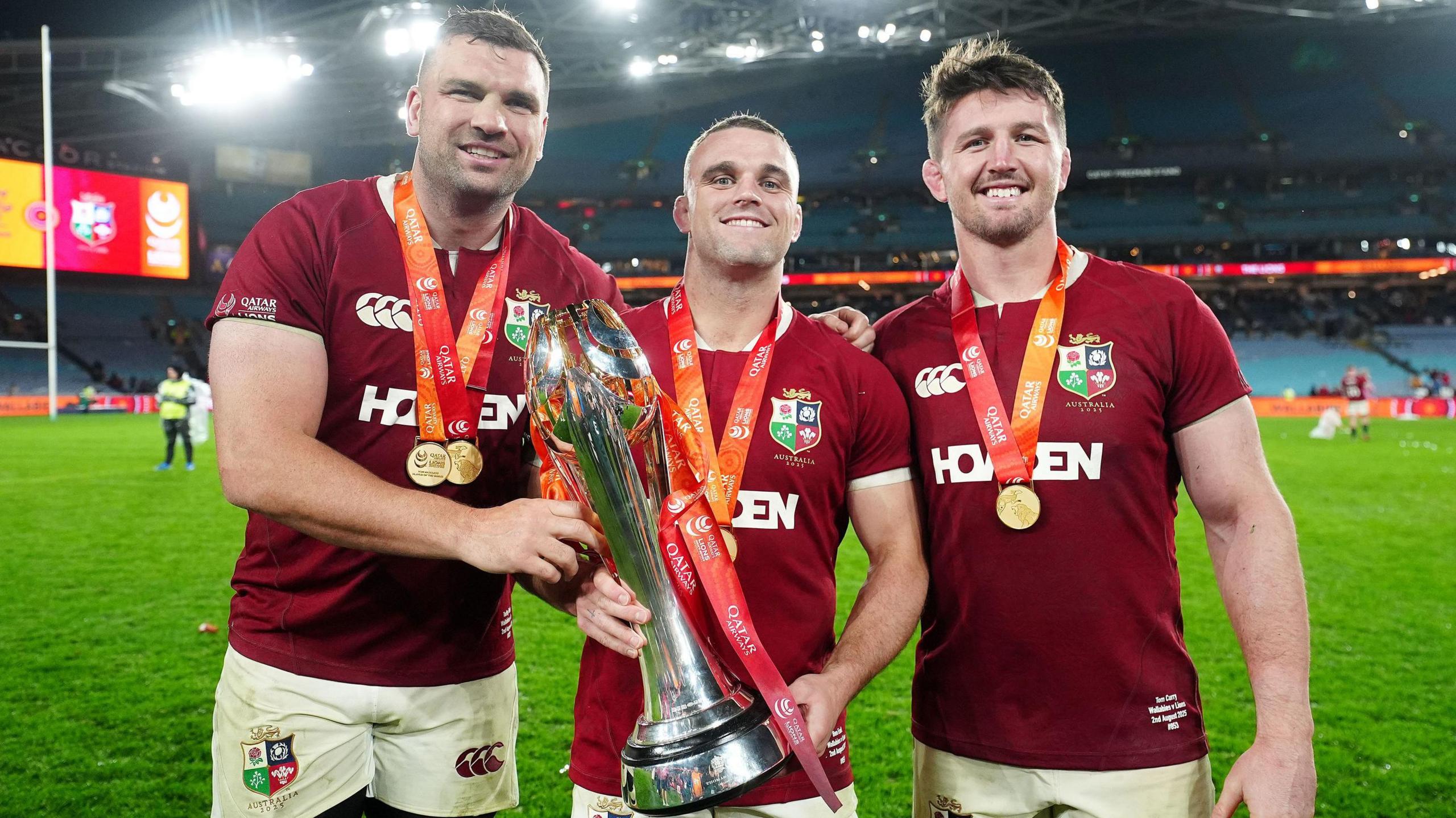 Tadhg Furlong, Ben Earl and Tom Curry in British and Irish Lions kit