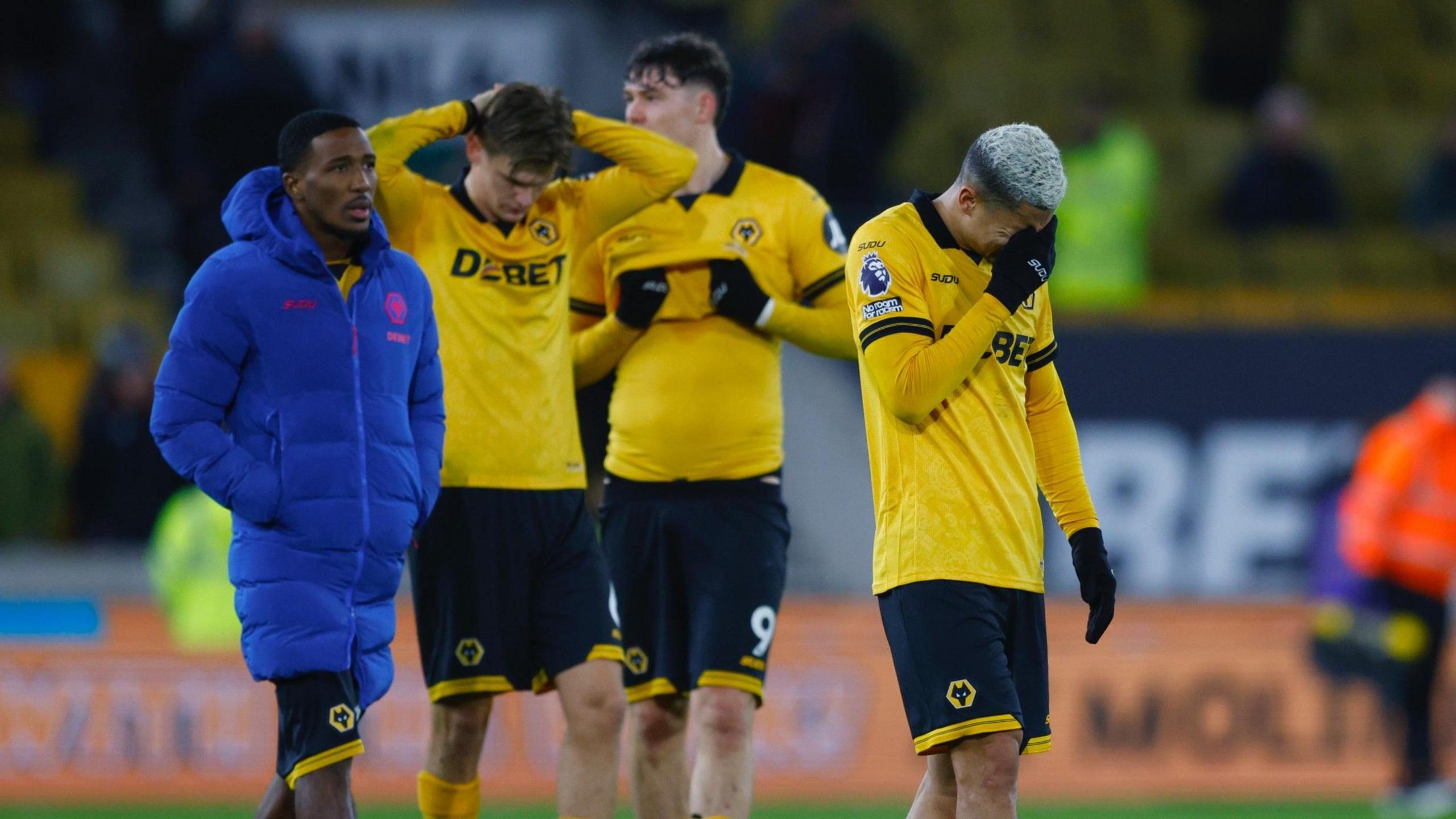 Wolves players look dejected 