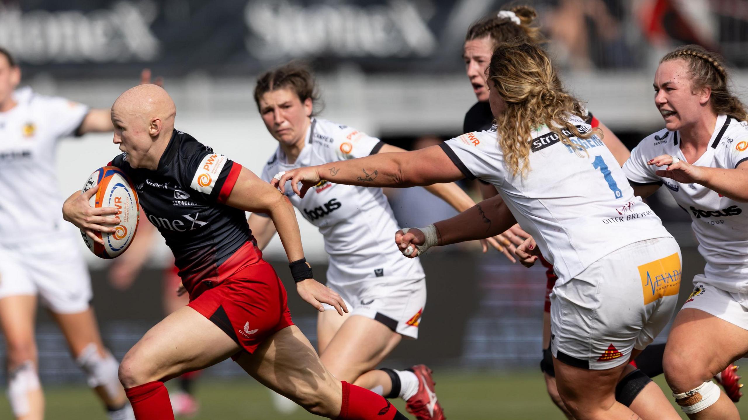 Saracens' Olivia Apps runs against Exeter