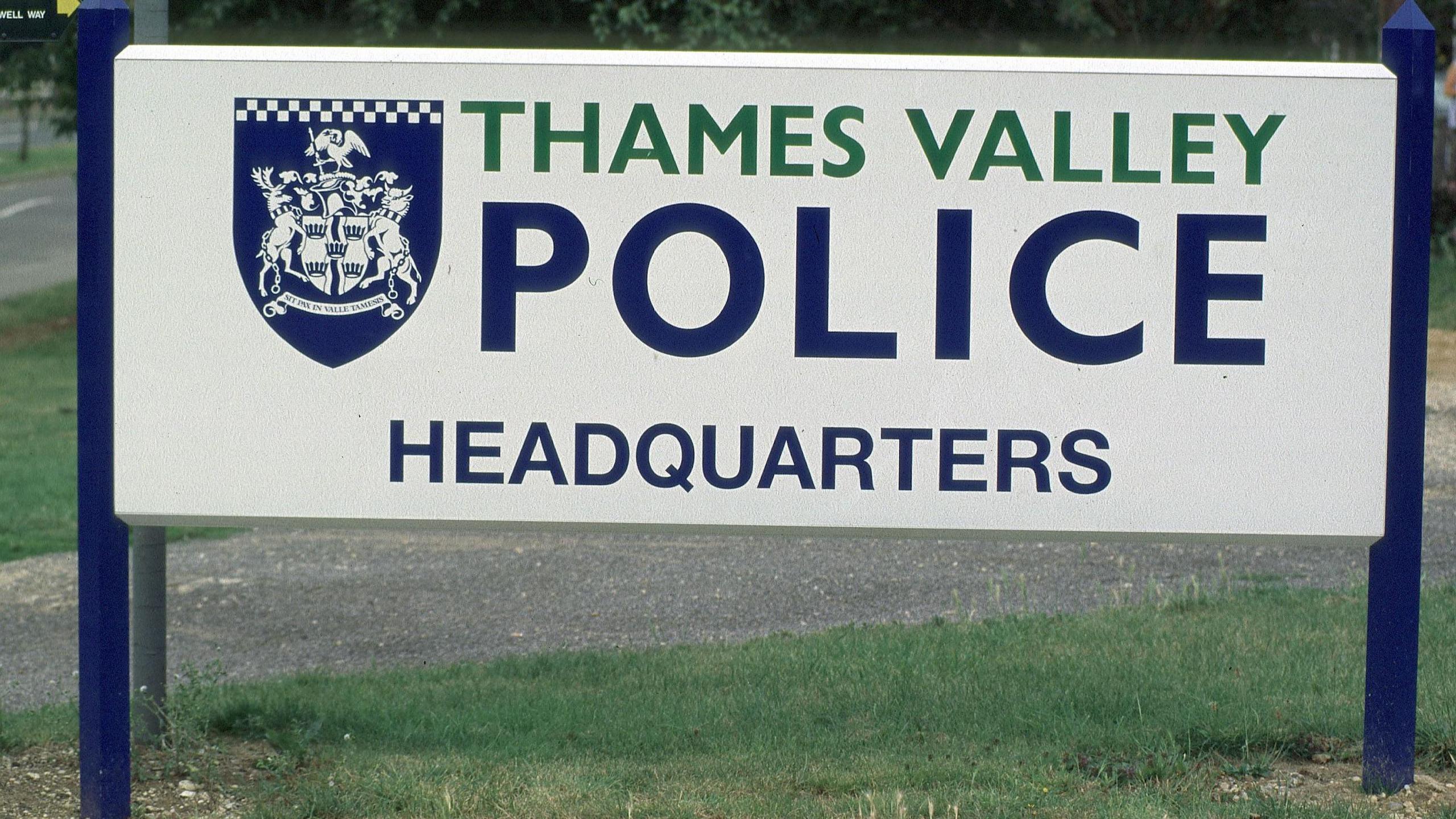 Sign that reads "Thames Valley Police headquarters" with the force's logo.