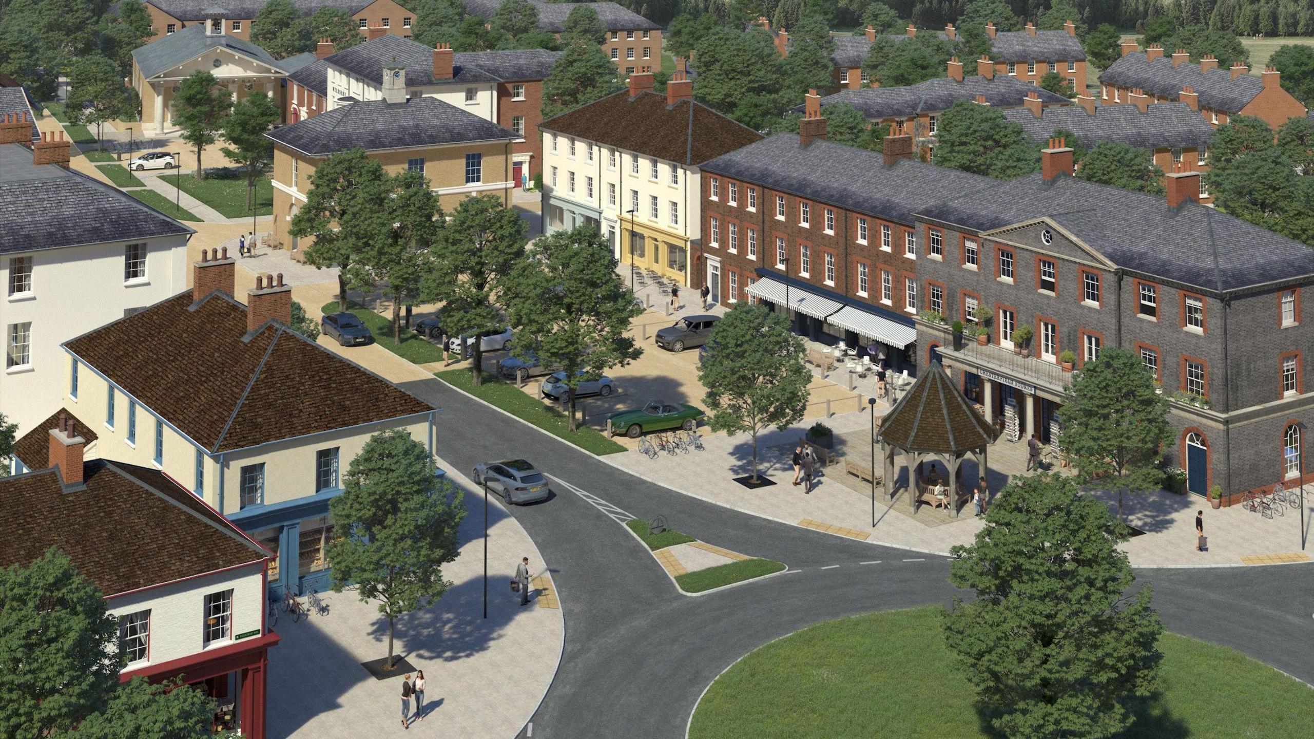 The computer generated image shows a roundabout with a tree in the middle and behind it two rows of shops with homes above.
There are many trees and seating areas.